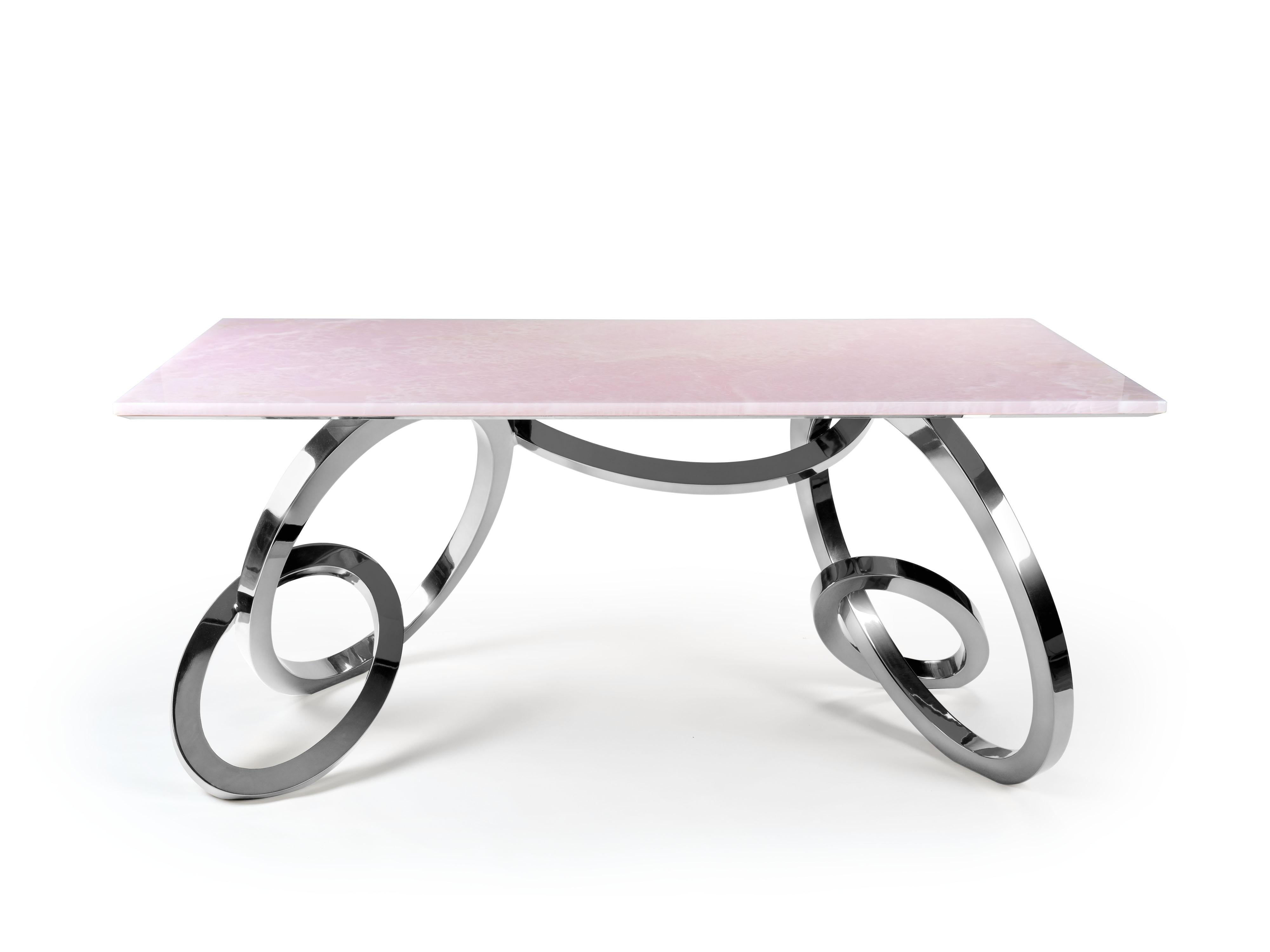 Bangles Desk by Barberini & Gunnell
Limited Edition of 15
Dimensions: D 87 x W 180 x H 76 cm.
Materials: Pink Onyx, mirror polished stainless steel.

Limited Edition, signed and numbered by the artists, comes with a Certificate of