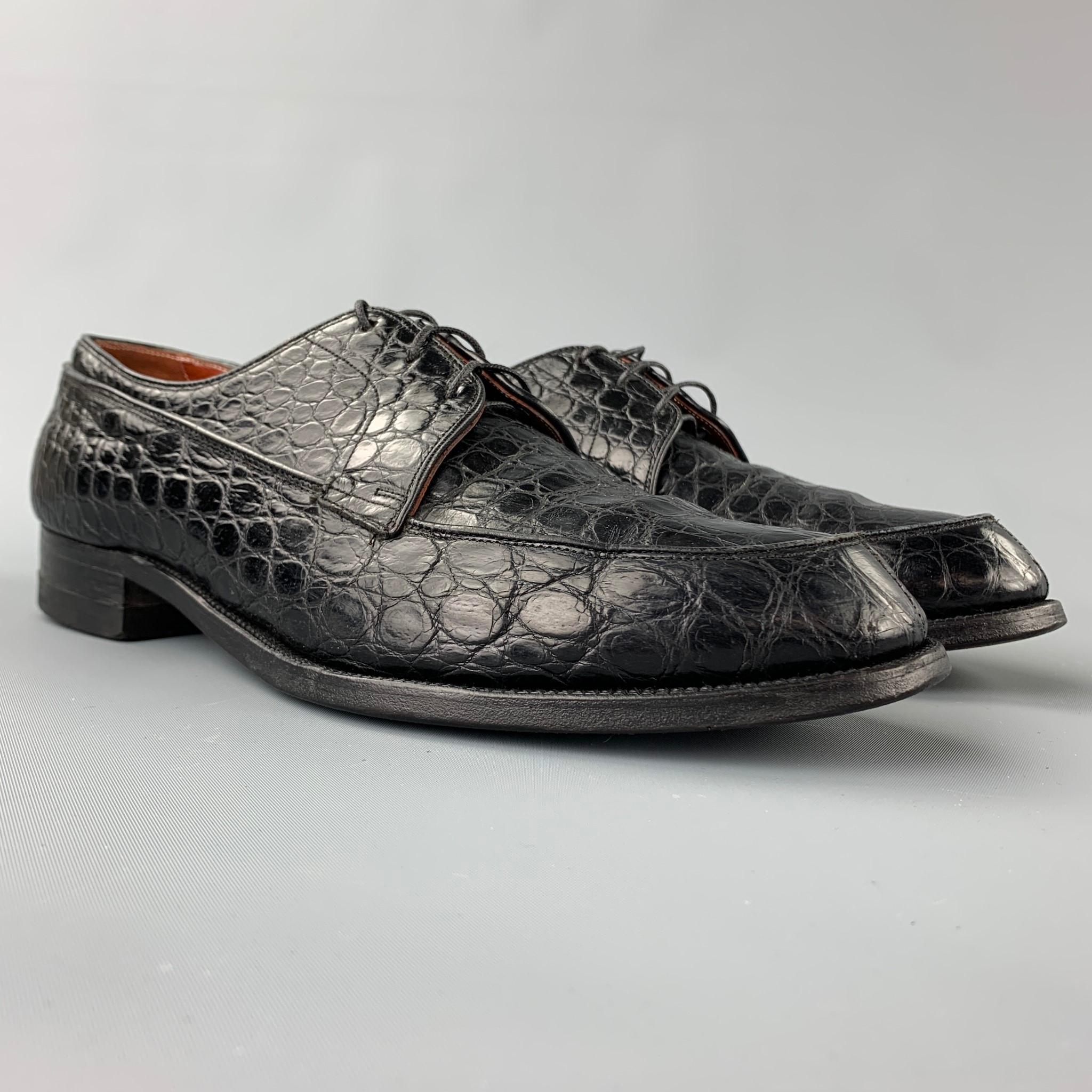 BANISTER shoes comes in a black embossed alligator leather featuring a cap toe, wooden sole, and a lace up closure. Moderate wear.

Good Pre-Owned Condition.
Marked: 9 D

Outsole:

11.5 in. x 4 in. 