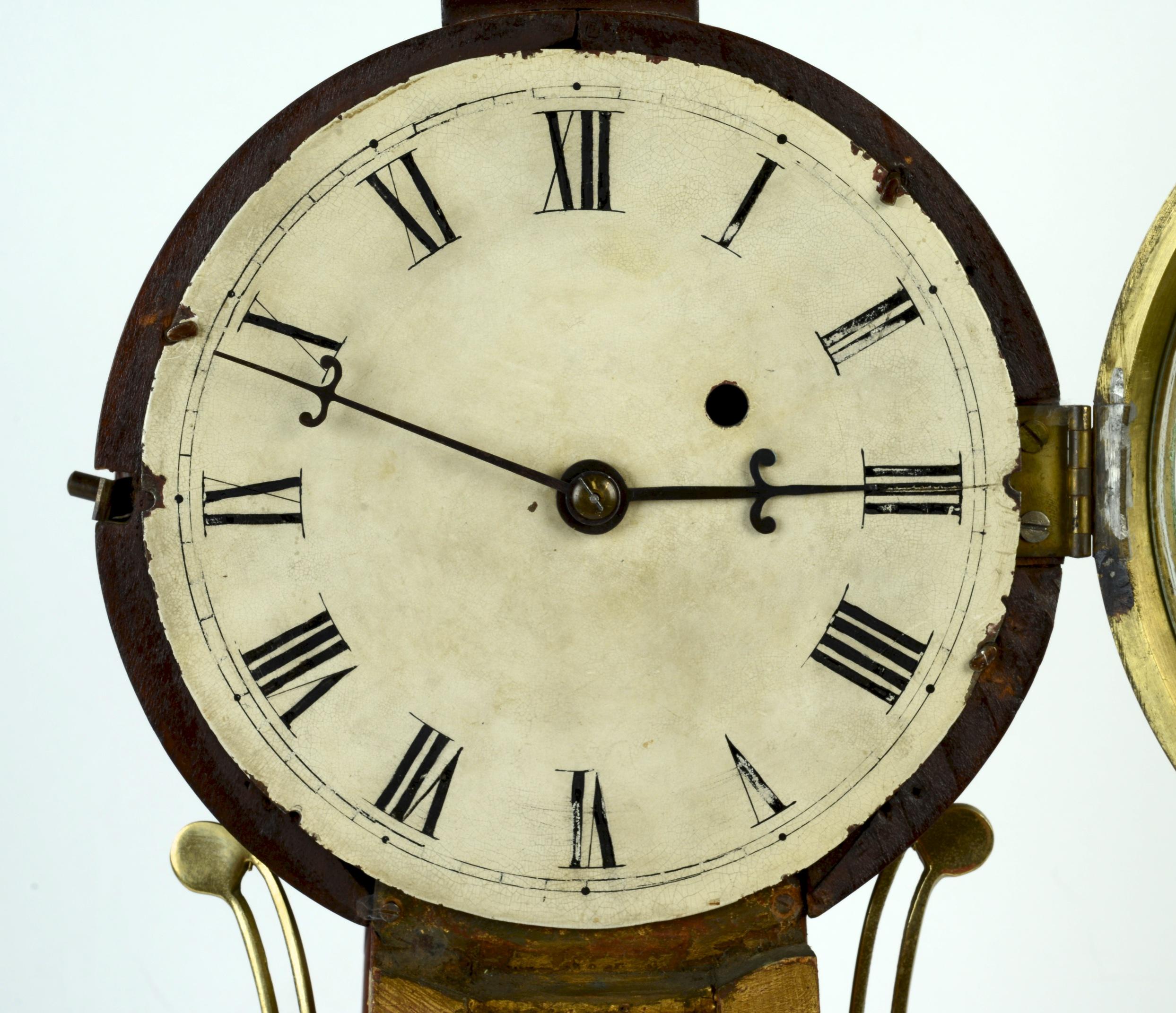 Banjo clock, c1820, antique patent timepiece. This well-known clock type was patented by Simon Willard in 1802 as the “Improved Timepiece.” Today it is more commonly referred to as a “banjo” clock because of its shape. This clock has an old surface