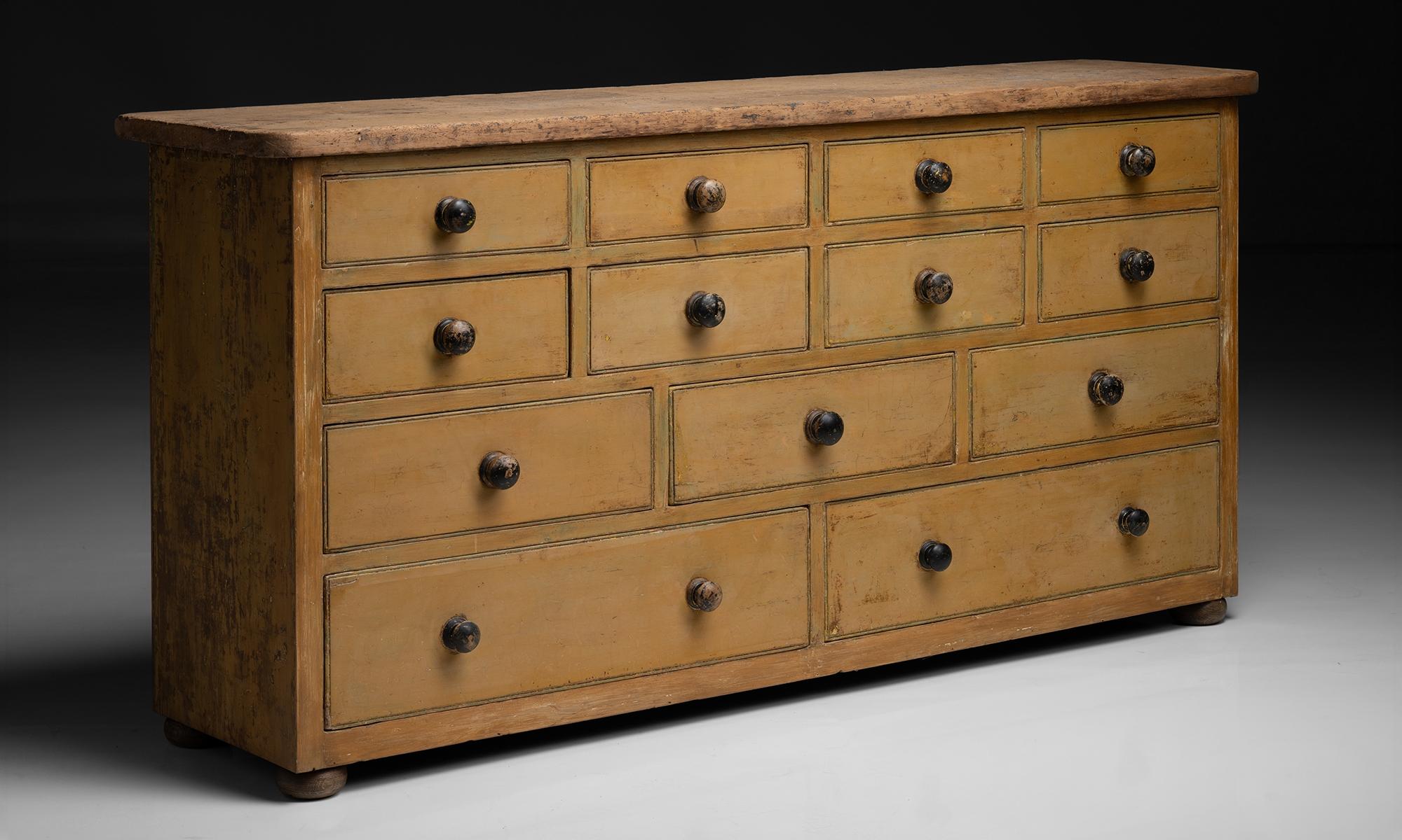 Made in England circa 1890

Scrubbed pine plank top, over drawers in original period finish with ebonised handles.

72