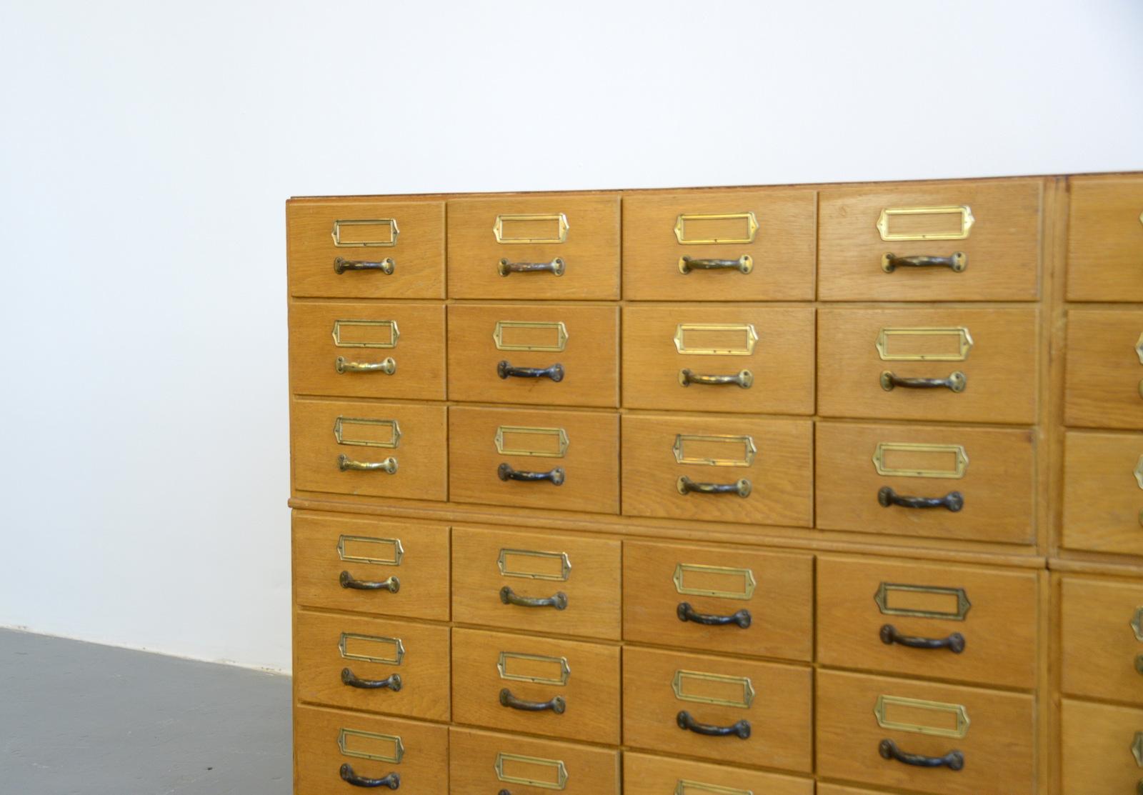 Bank of light oak filing drawers, circa 1950s

- Light oak drawers and frame
- Steel handles and card holders
- Ply drawer bottoms
- German ~ 1950s
- 188cm wide x 91cm tall x 48cm deep

Condition Report

Fully restored with minimal