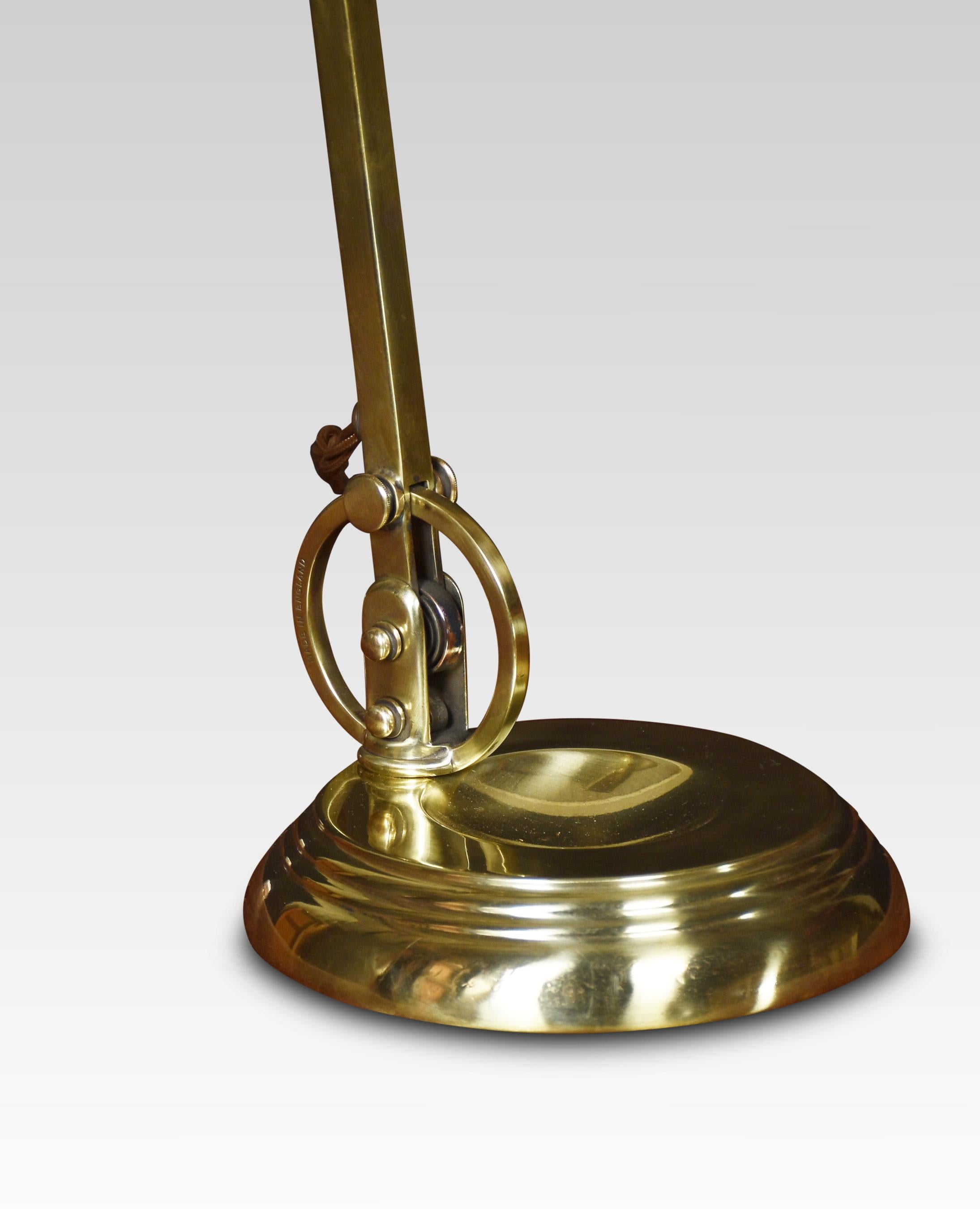 Bankers brass desk lamp, the shaped brass base, and pivoted sweeping arm supporting adjustable lampshade. The lamp has been rewired.
Dimensions
Height 16.5 inches
Width 8.5 inches
Depth 7 inches.