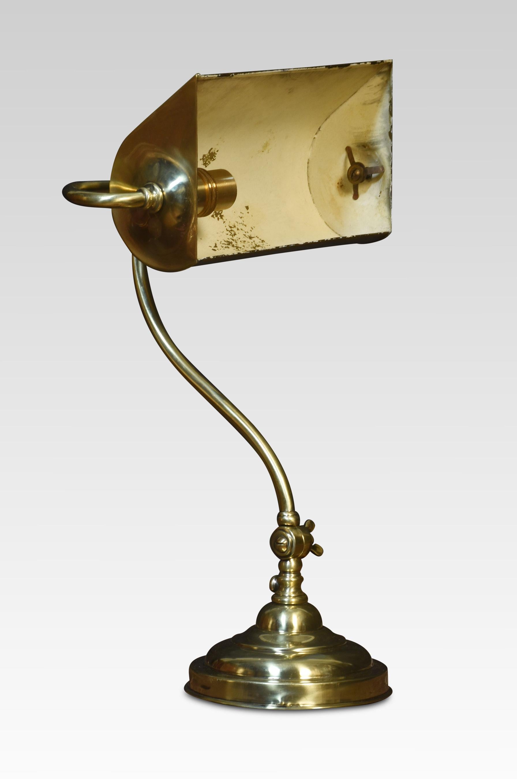 Bankers brass desk lamp, the shaped brass base, and pivoted sweeping arm supporting adjustable lampshade. The lamp has been rewired.
Dimensions
Height 15.5 inches
Width 12 inches
Depth 8 inches.