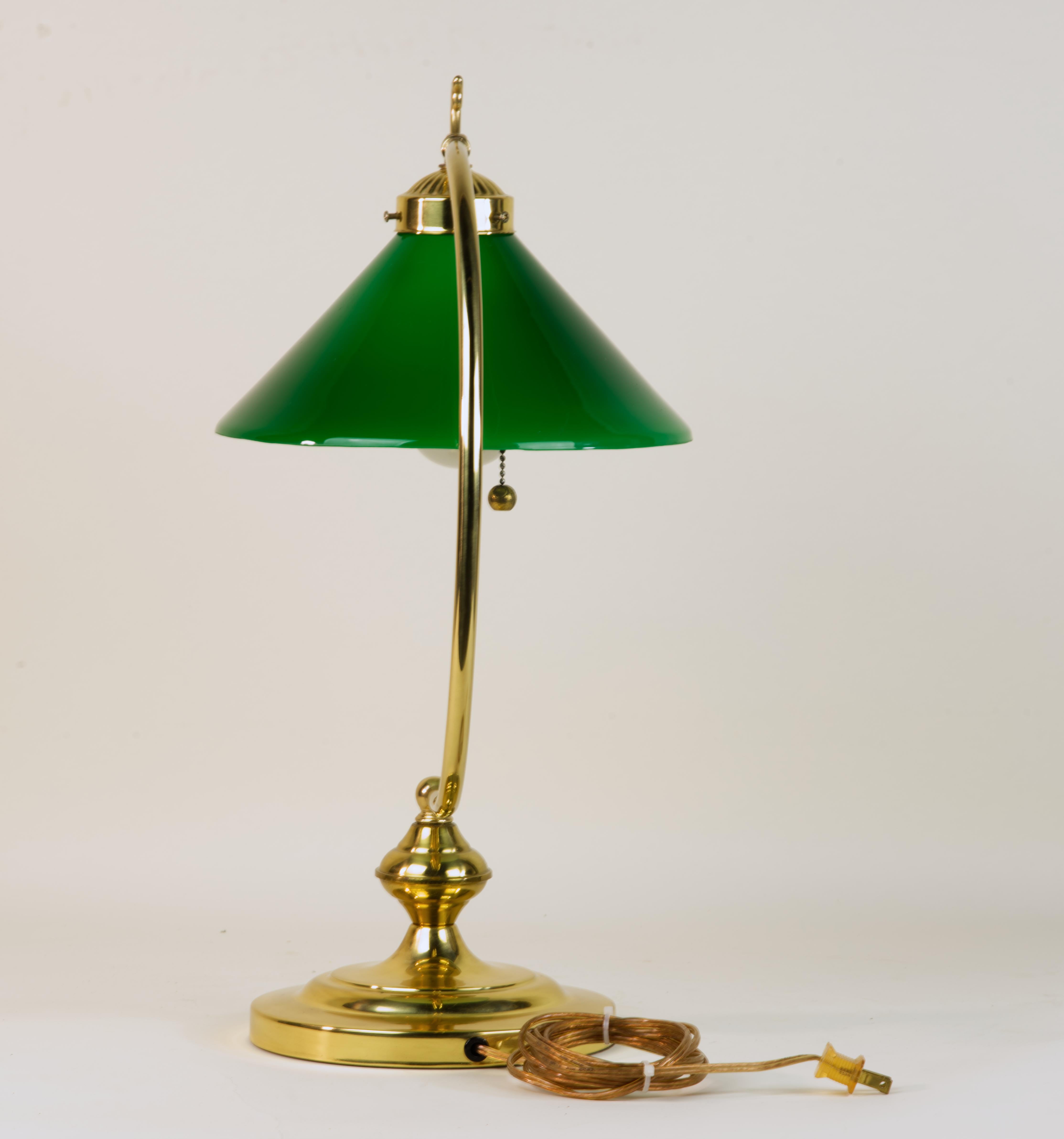 Lovely 1970s Bankers Lamp. 
Everything on it is original except the socket which was replaced with same model modern one. Brass finish has a few small spots, consistent with the age. 

