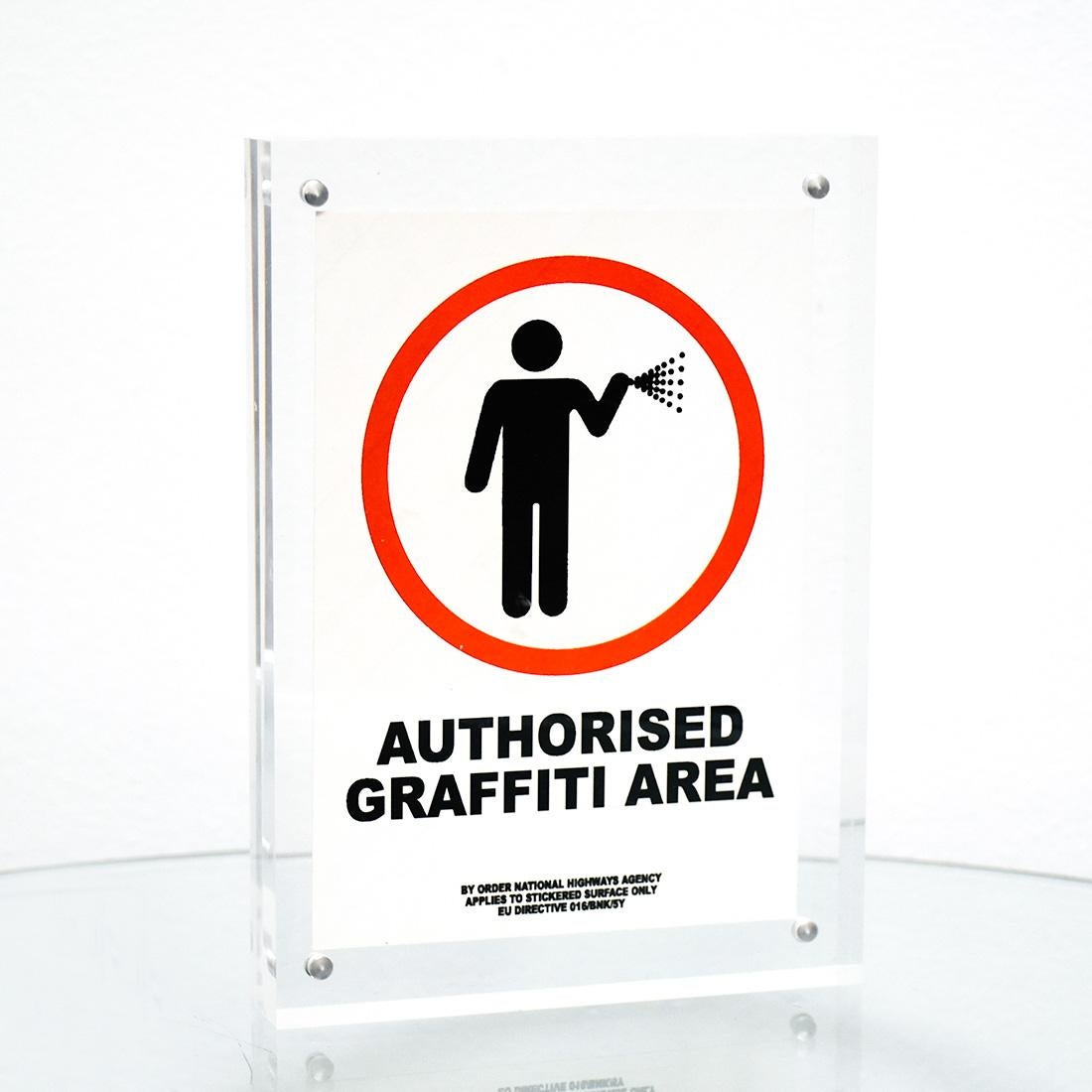 Adesivo Area Autorizzata Graffiti 016/BNK/5Y (con cornice) - Print di Banksy