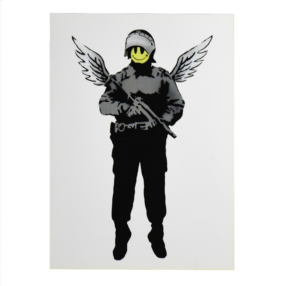 Super cool and rare Banksy Angel Cop Showcard.
Also known as Flying Copper.
Banksy also released a print with a similar image (upper half). The image on this Showcard is of a stencil original from 2005.
From the Banksy vs Warhol exhibition held at