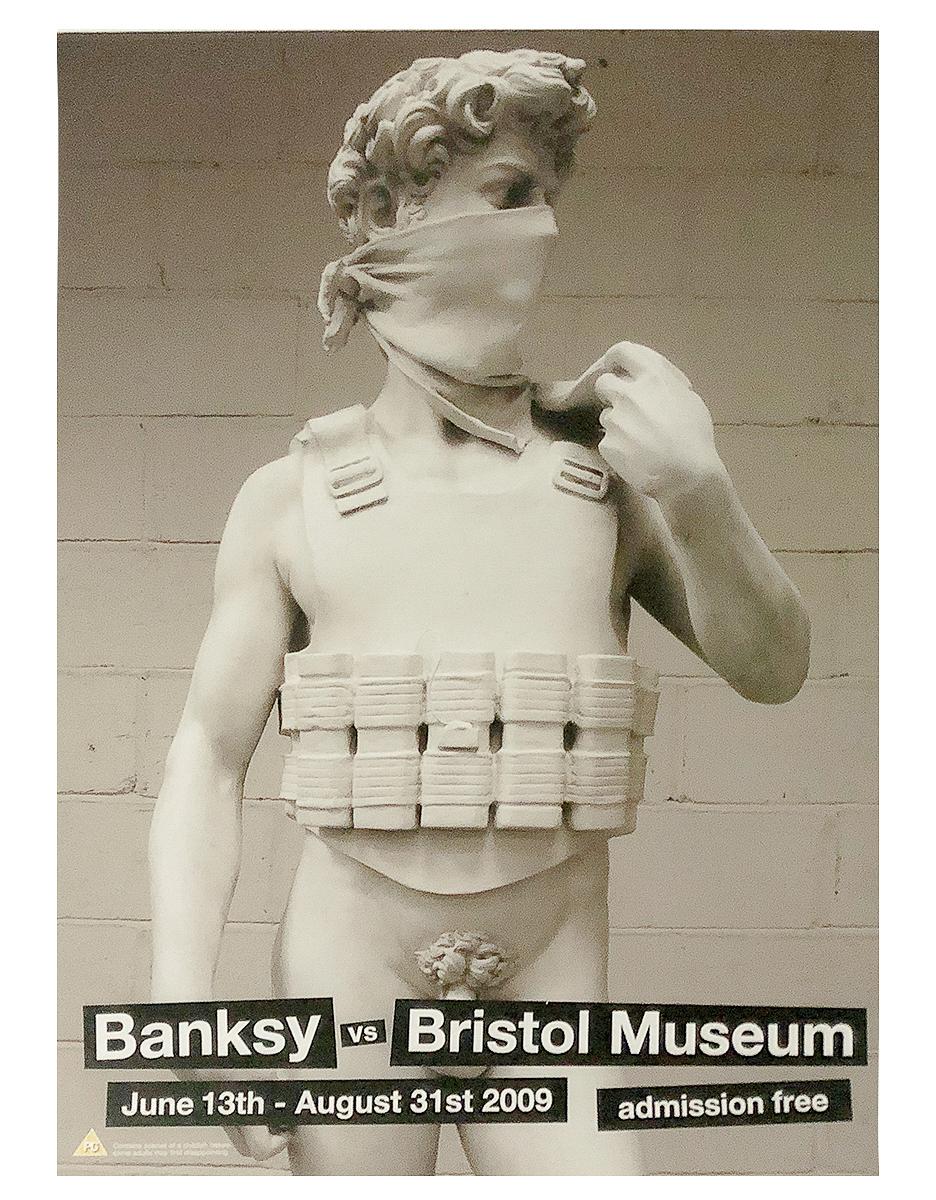 Original exhibition poster from the Banksy vs Bristol Museum show.
Released in 2009.
Depicts the Banksy’s version of the David statue.
Acquired directly from POW (Pictures On Walls-Publisher).
Offset Lithograph printed in colors.

Certificate of