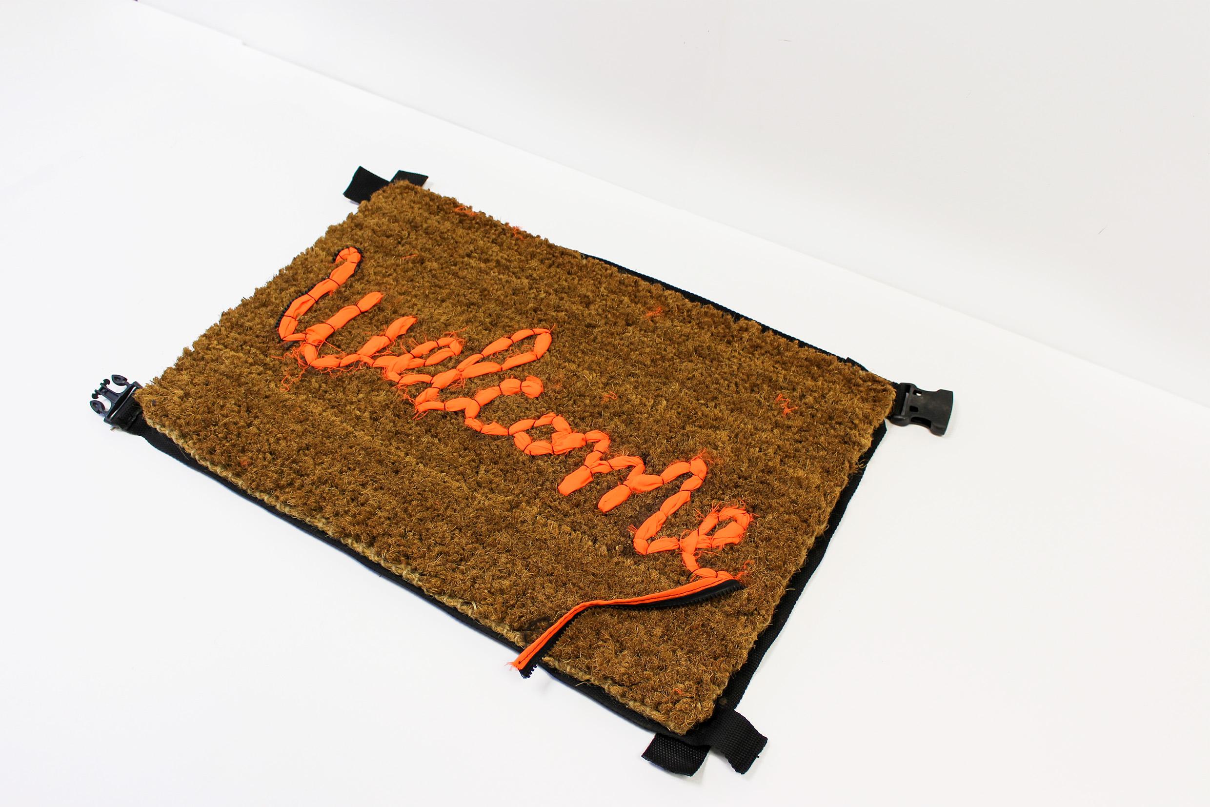 banksy welcome mat