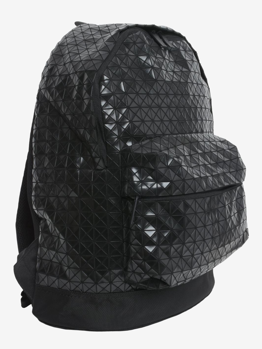 Bao Bao Issey Miyake Backpack is an unique accessory featuring Miyake's iconic embossed geometric pattern, adjustable shoulder straps, front zippered pocket, single interior compartment with zippered pocket and interior logo applique. Bao Bao are