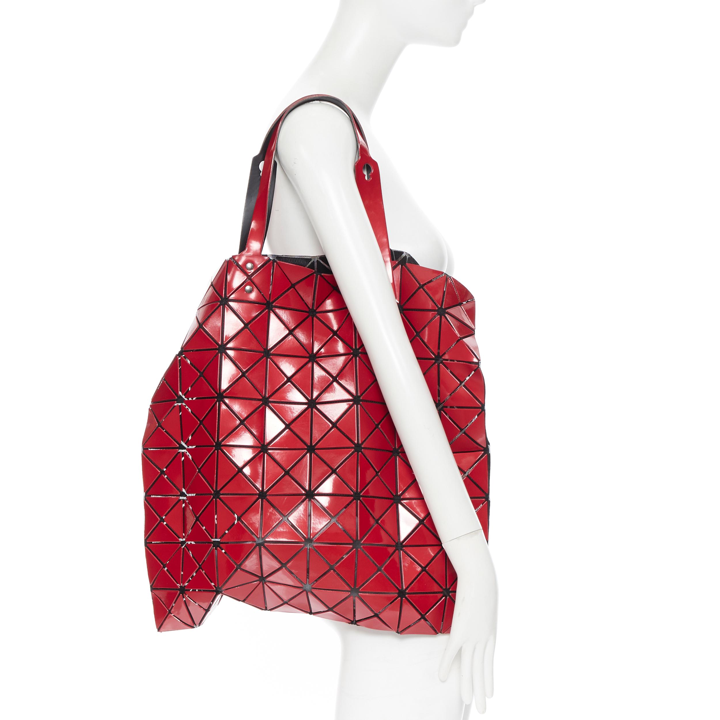 BAO BAO ISSEY MIYAKE Prism red PVC geometric mesh leather handle tote bag
Brand: Bao Bao Issey Miyake
Model Name / Style: Prism
Material: PVC
Color: Red
Pattern: Solid
Extra Detail: Geometric triangular PVC chips embellished on black mesh net.
