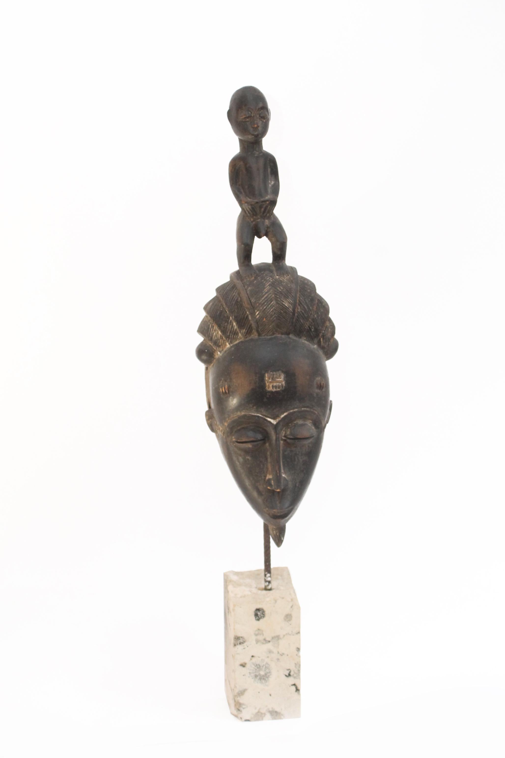 Hand-Carved Baoule' African Mask  Mid-century (71x15x13cm) with Floridian coral pedestal