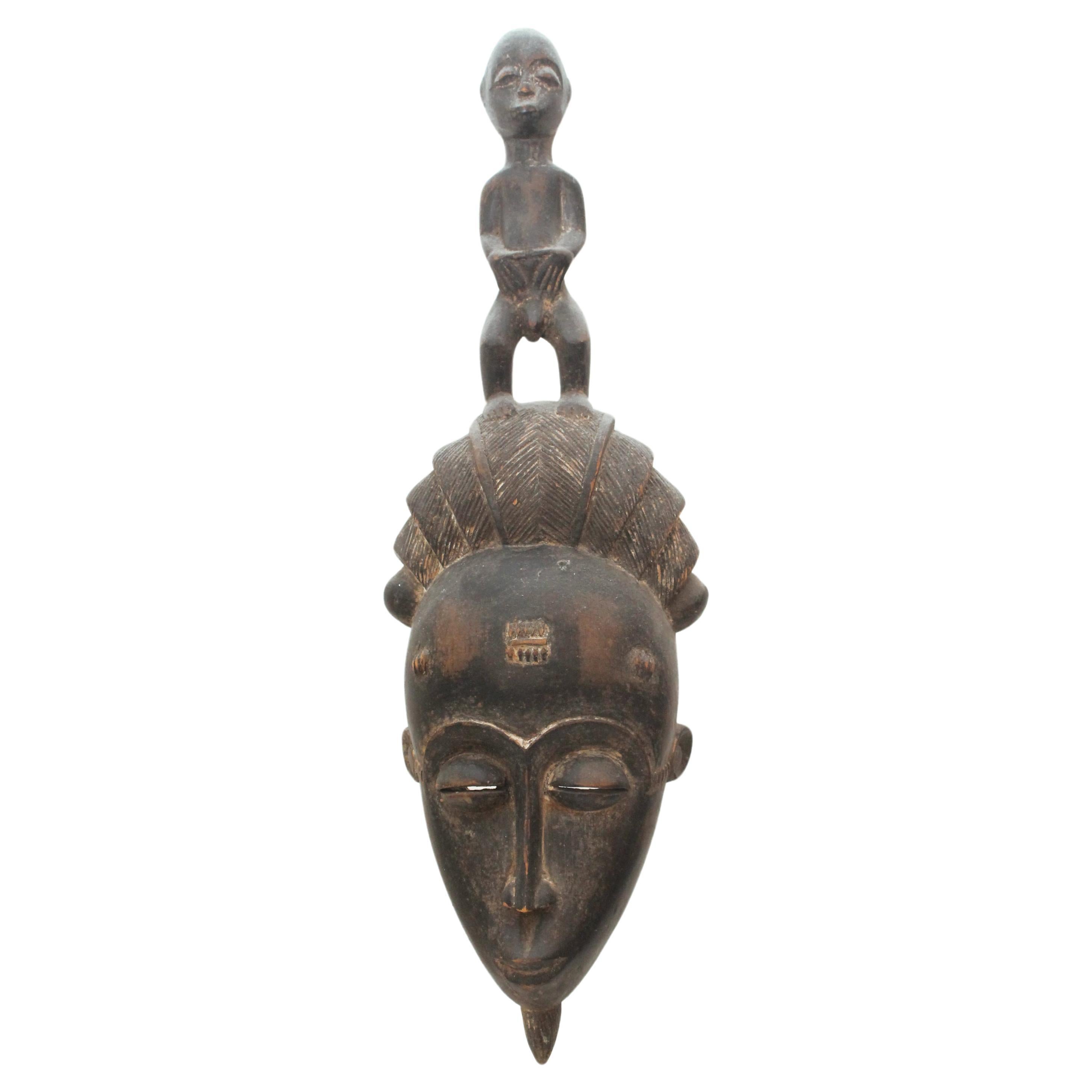 Baoule' African Mask  Mid-century (71x15x13cm) with Floridian coral pedestal