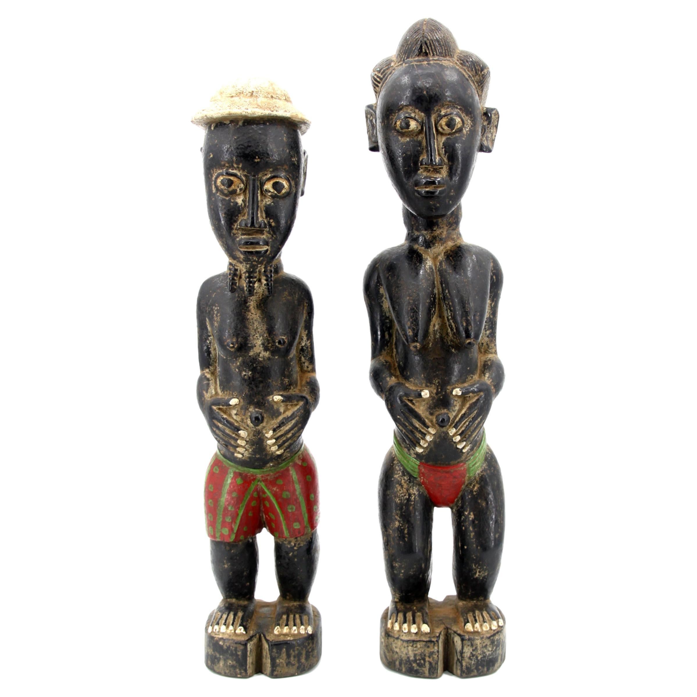 Baoulé  Statues en bois de la côte ivoire d'Afrique, lot de 2 en vente