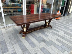 Tavolo Art Deco di grandi dimensioni Baptistin Spade'1891-1969' in noce, pelle e bronzo