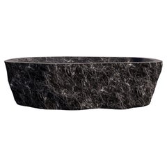 Baptiz Baignoire en marbre noir par Andre Monnier