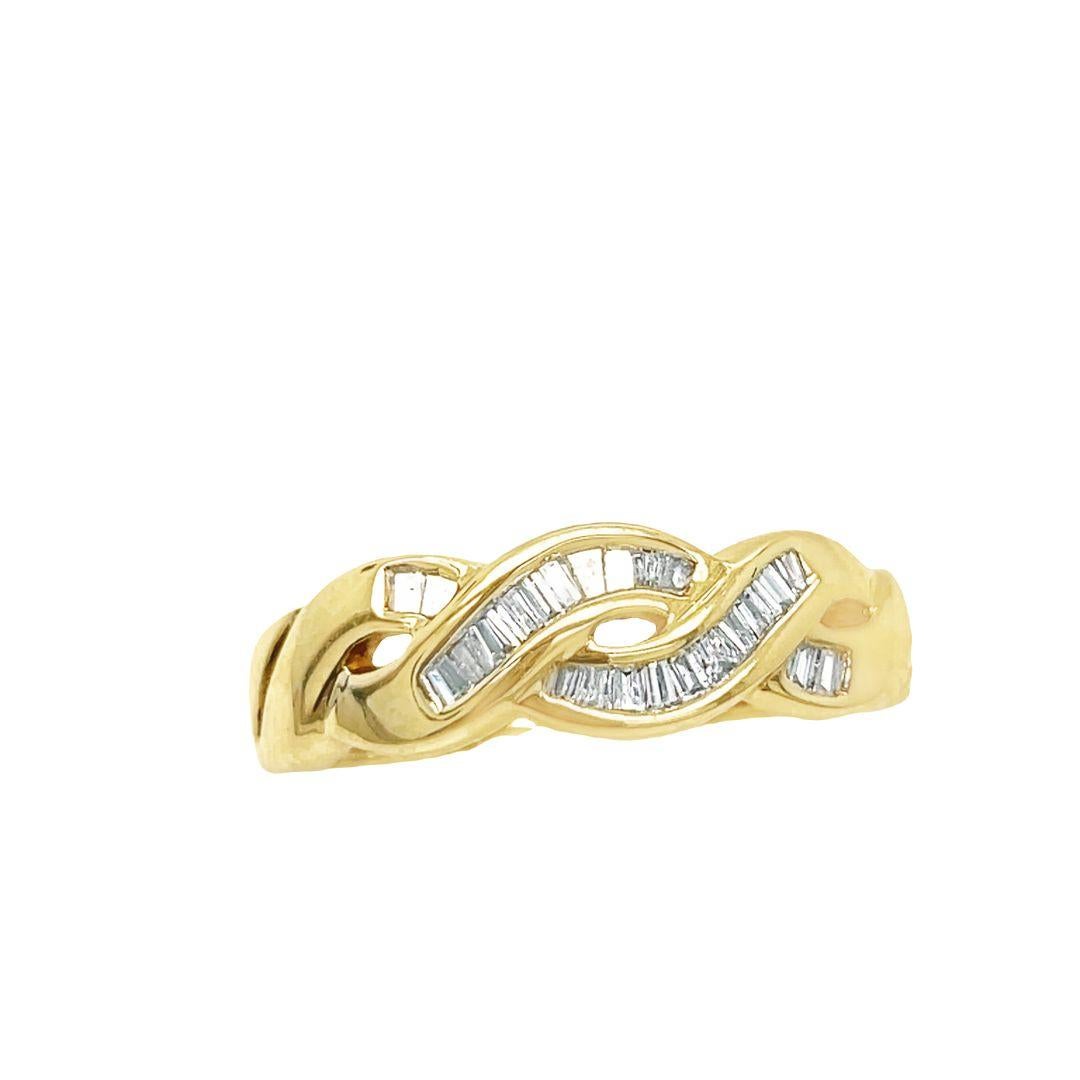 Simple and elegant diamond twist ring containing twenty four baguette cut diamonds weighing approx. 0.48 carat. It features channel set straight baguette cut diamonds for a timeless, eye catching style and creates an accessory thrilling to everyday
