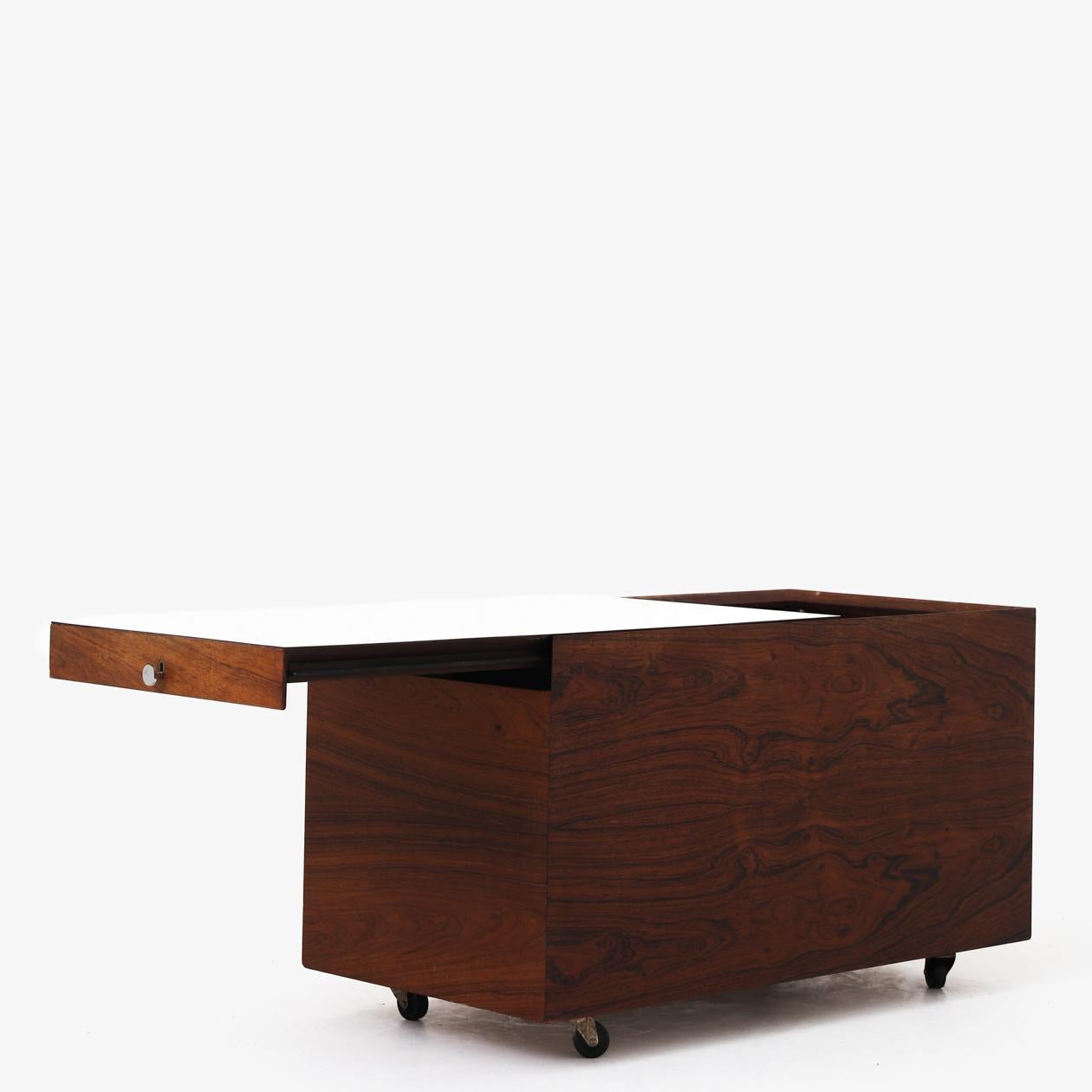 Brazilian rosewood bar with white Formica top from the 1960s. Poul Nørreklit / George Petersens Møbelfabrik.