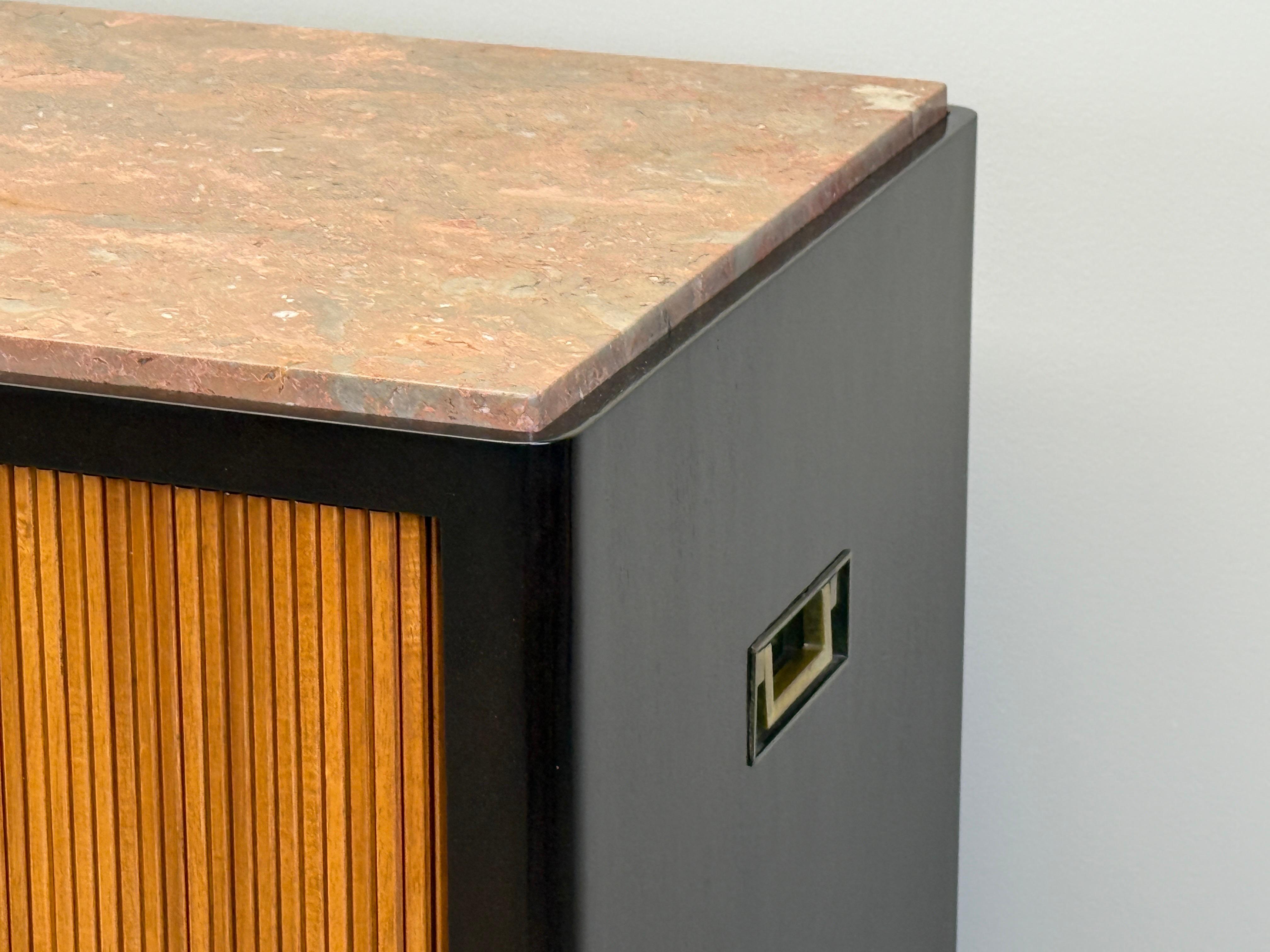 A beautiful model 5466 mahogany and walnut bar cabinet with marble top and brass hardware. Designed by Edward Wormley for Dunbar. Fully restored. 