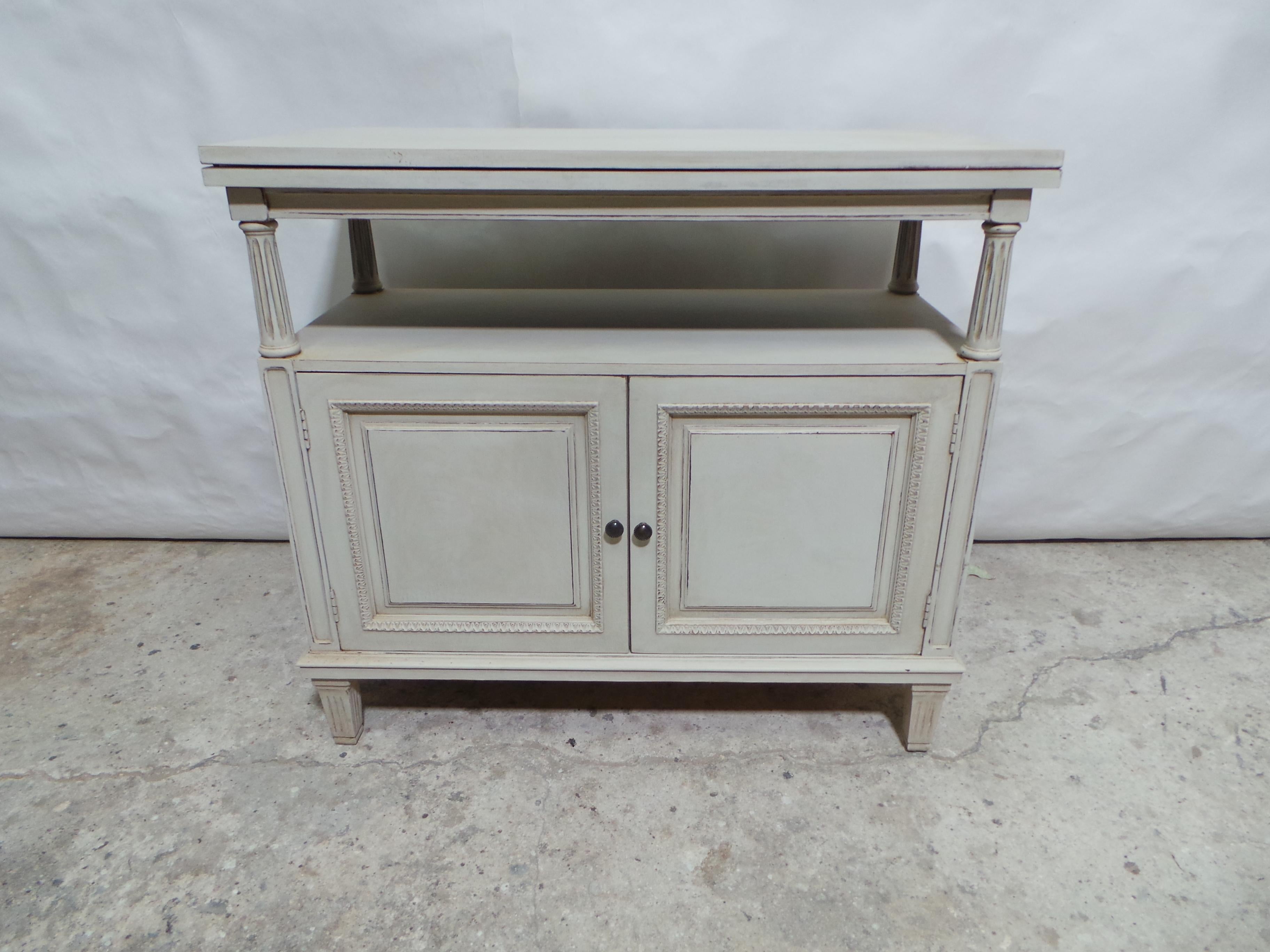 This is a unique Gustavian style Bar Cabinet. its been restored and repainted with Milk Paints 