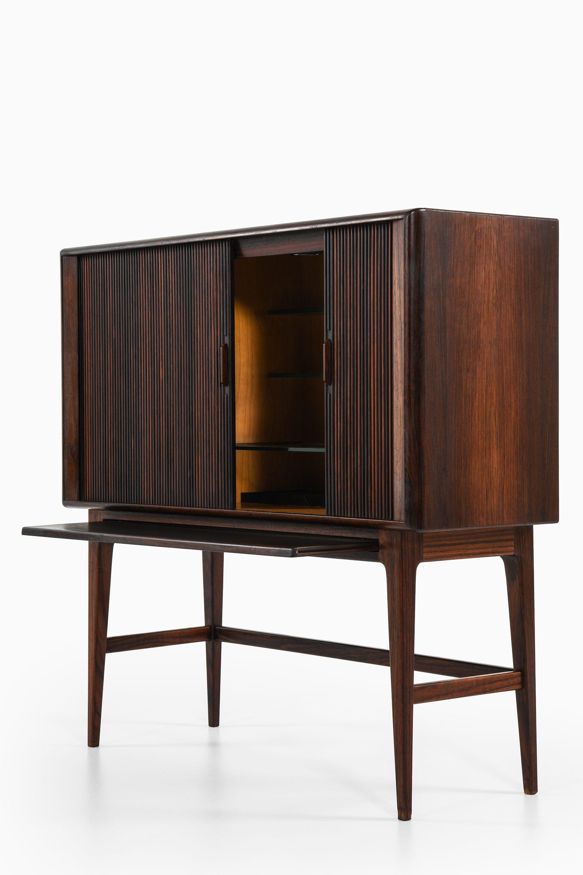 Bar Cabinet in Rosewood by Kurt Østervig, 1960's

Additional Information:
Material: Rosewood
Style: Mid century, Scandinavian
Produced by K.P Møbler in Denmark
Dimensions (W x D x H): 110 x 40 x 110 cm