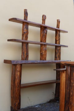 bar cabinet is handcrafted in solid walnut and oak