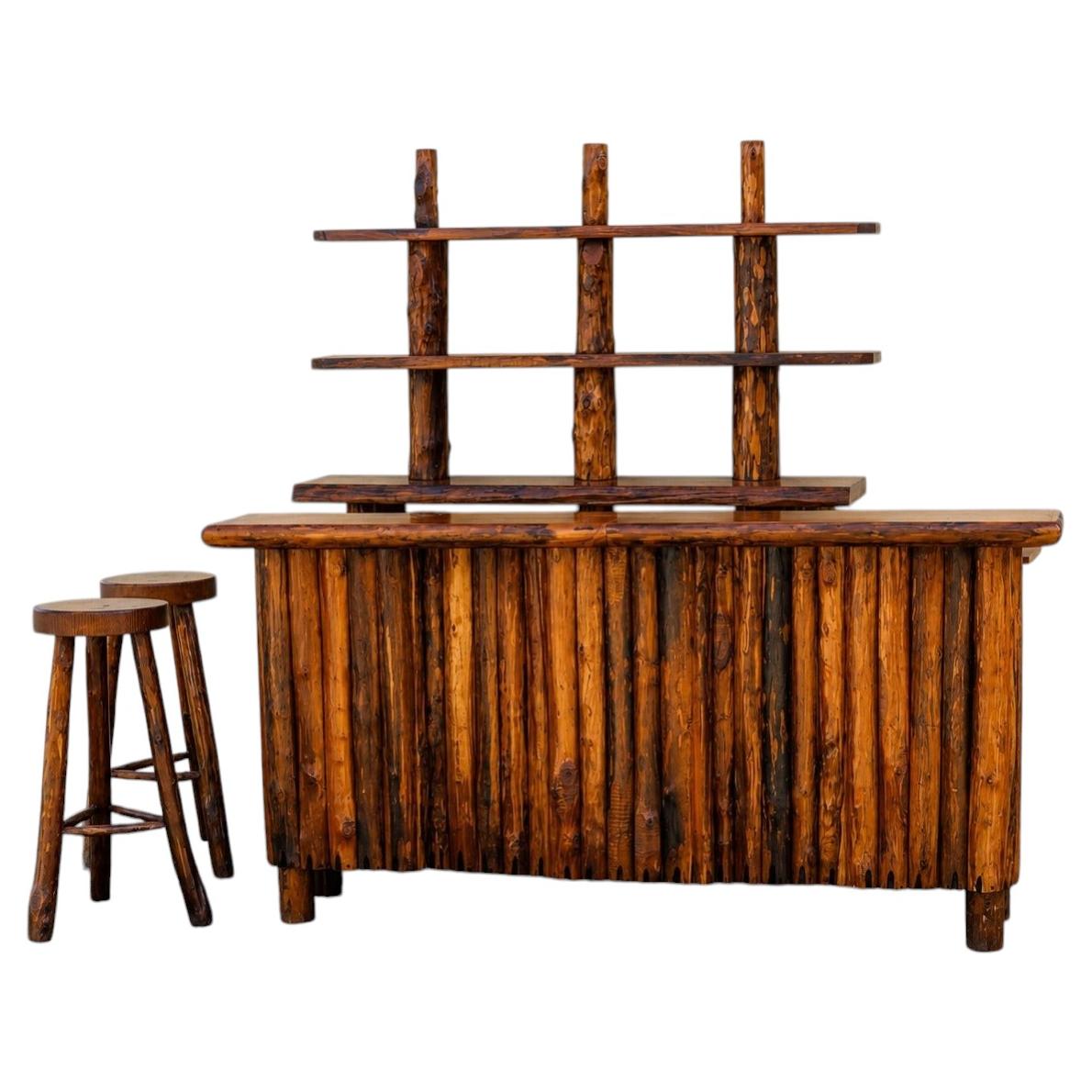 bar cabinet is handcrafted in solid walnut and oak