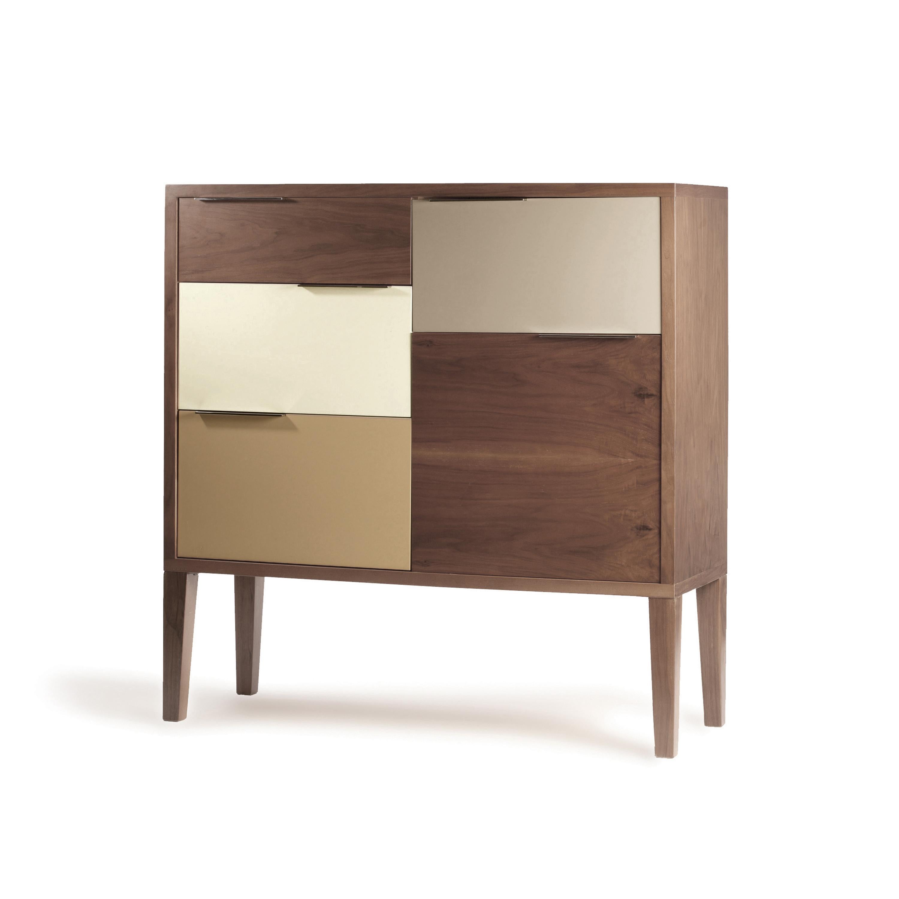 Muse bar cabinet is a high quality product by Mambo Unlimited Ideas, crafted in polished or matte wood veneer structure and feet, lacquered doors and drawers and stainless steel handles. It features four doors and one drawer. It clearly transpires