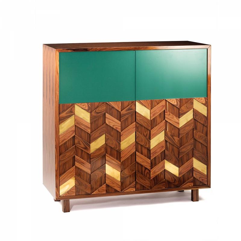 Samoa bar cabinet is a high quality product by Mambo Unlimited Ideas, crafted in polished or matte wood veneer structure and feet, brass applications and lacquered doors. It features a three dimensional design on its doors, elegant polished brass