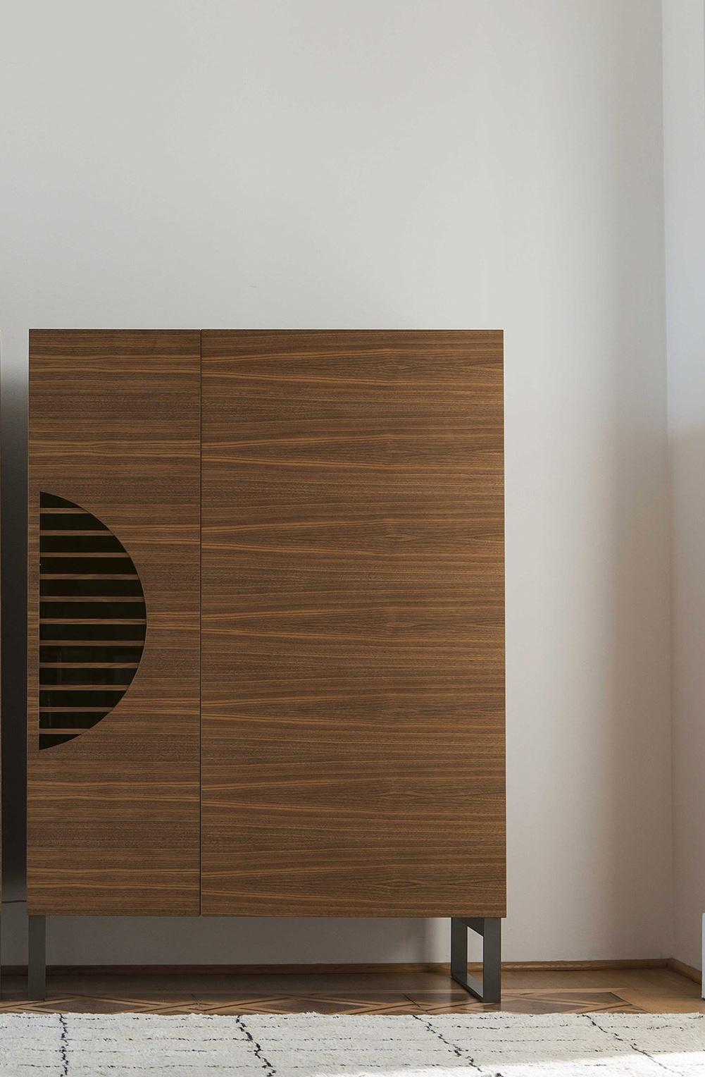 Brand: Porada
Design: Porada Design Team
Model: Polifemo Bar Cabinet

Inspired by Greek mythology and its famous cyclops, the Polyphemus Bar Cabinet brings myth to life in a modern and sophisticated furniture piece. By placing two units side by side