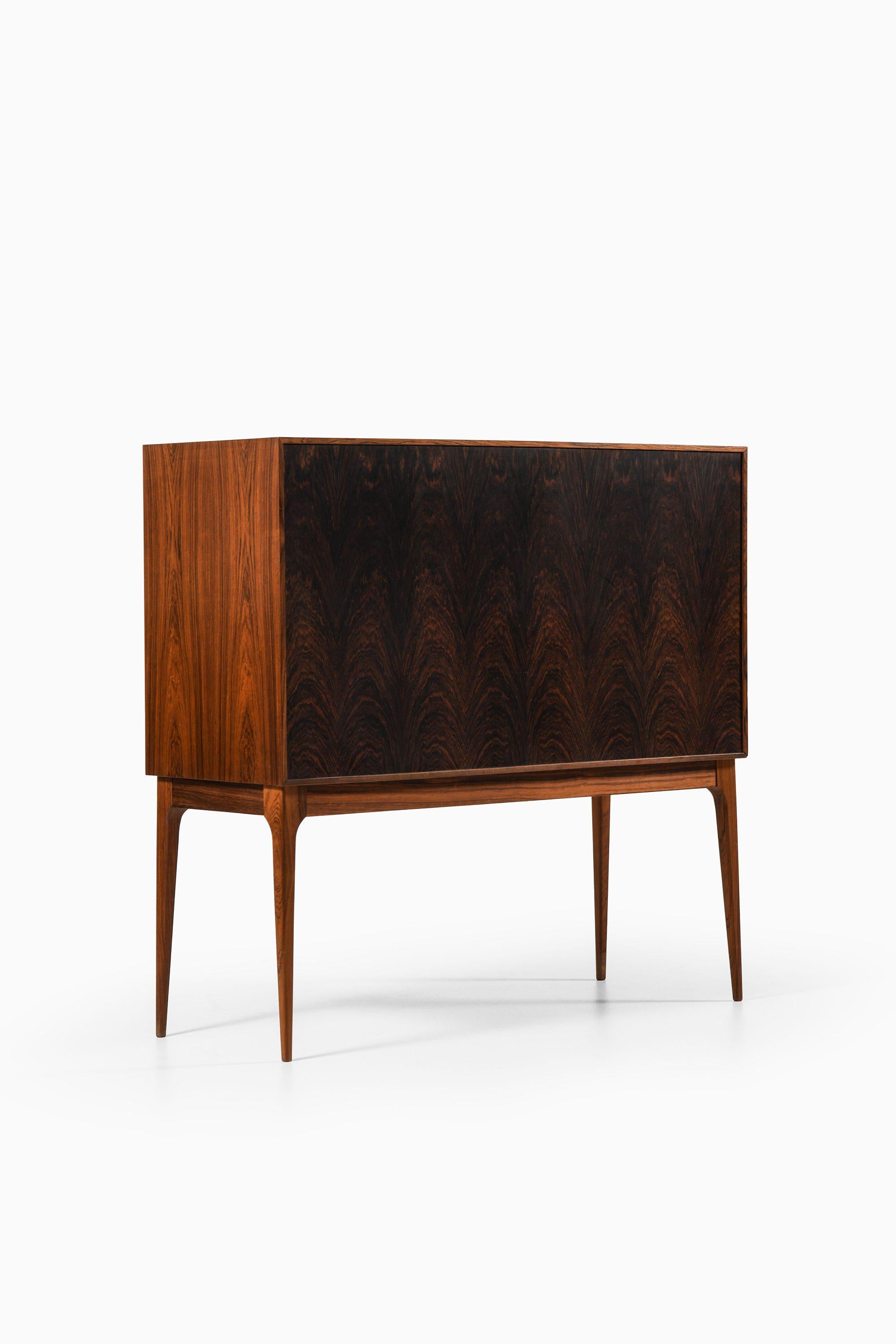 Danish Bar Cabinet with Tambour Doors in Rosewood and Brass by Kurt Østervig, 1960's For Sale