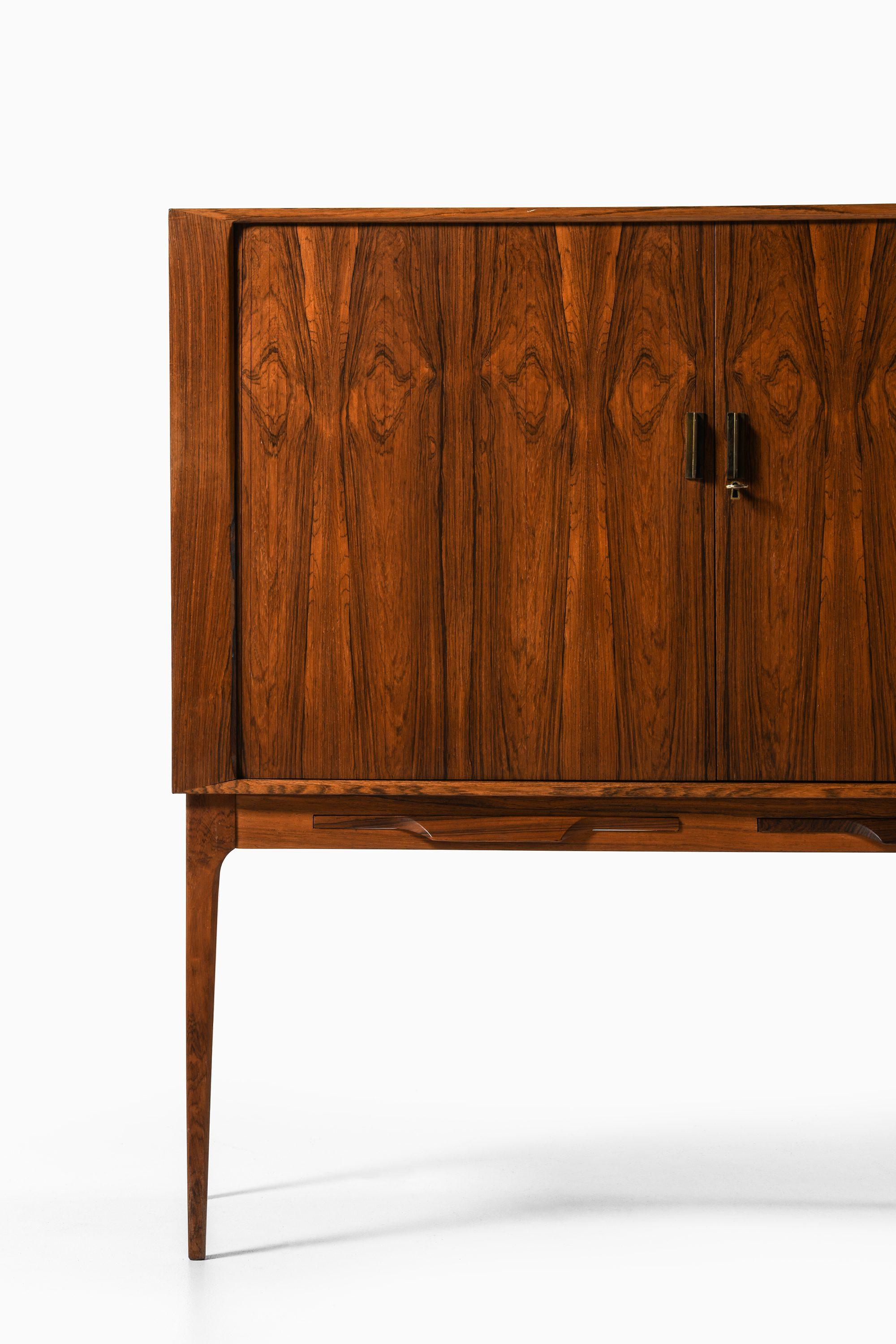 20th Century Bar Cabinet with Tambour Doors in Rosewood and Brass by Kurt Østervig, 1960's For Sale