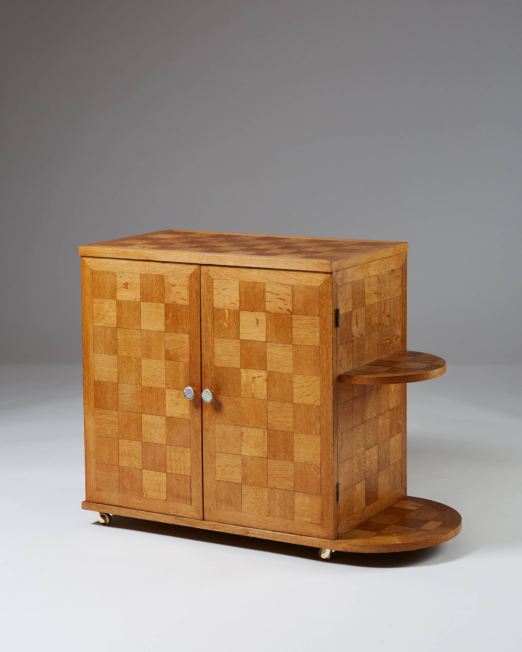 Bar cabinet, anonymous, 
Sweden, 1950s.
Oak.

Measures: H 66.7 cm/ 2' 2 5/8