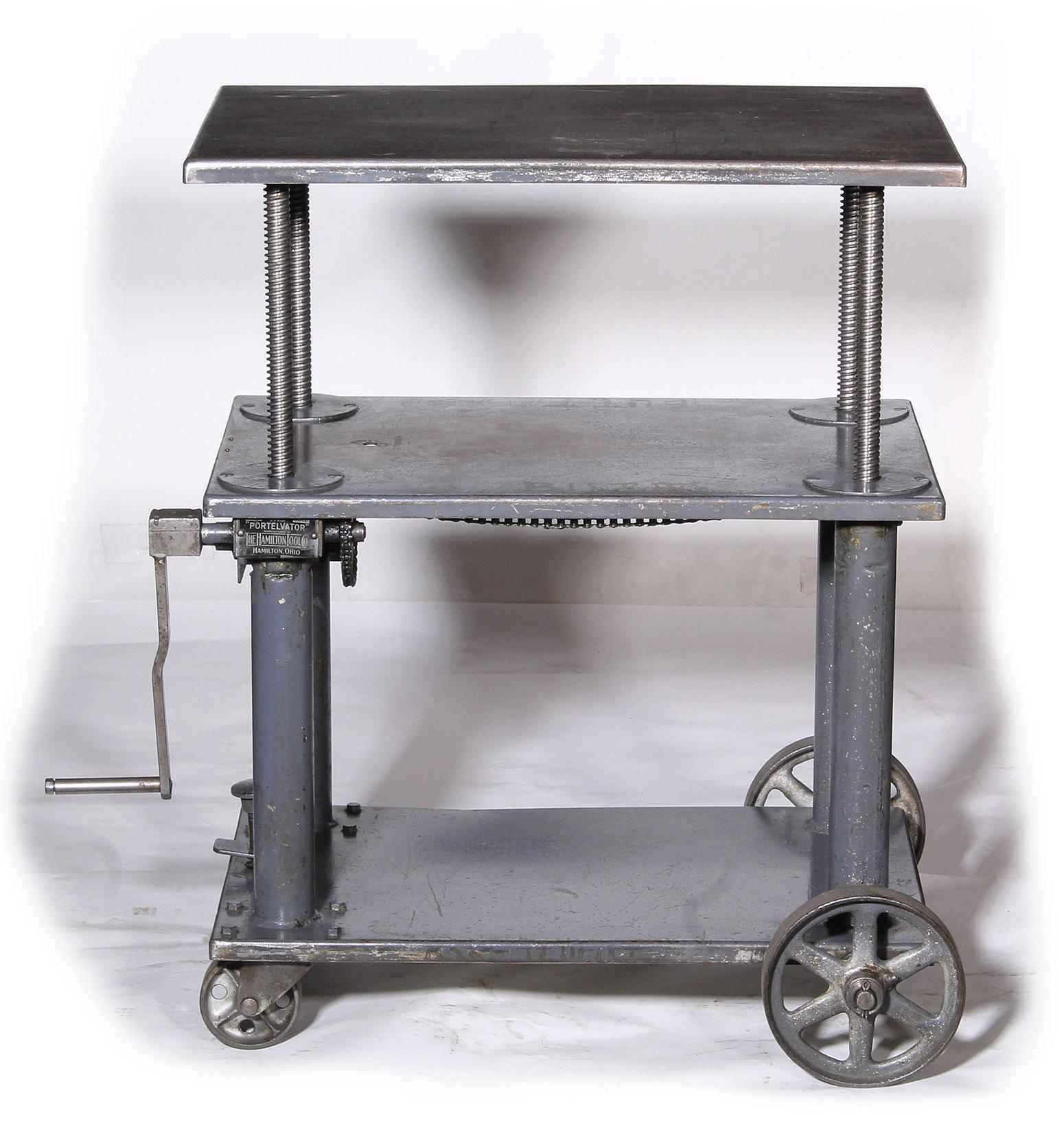 Bar cart, original steel metal rolling vintage industrial adjustable.
Height adjusts from 24