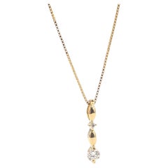 Colgante de diamantes en barra de oro amarillo de 18k