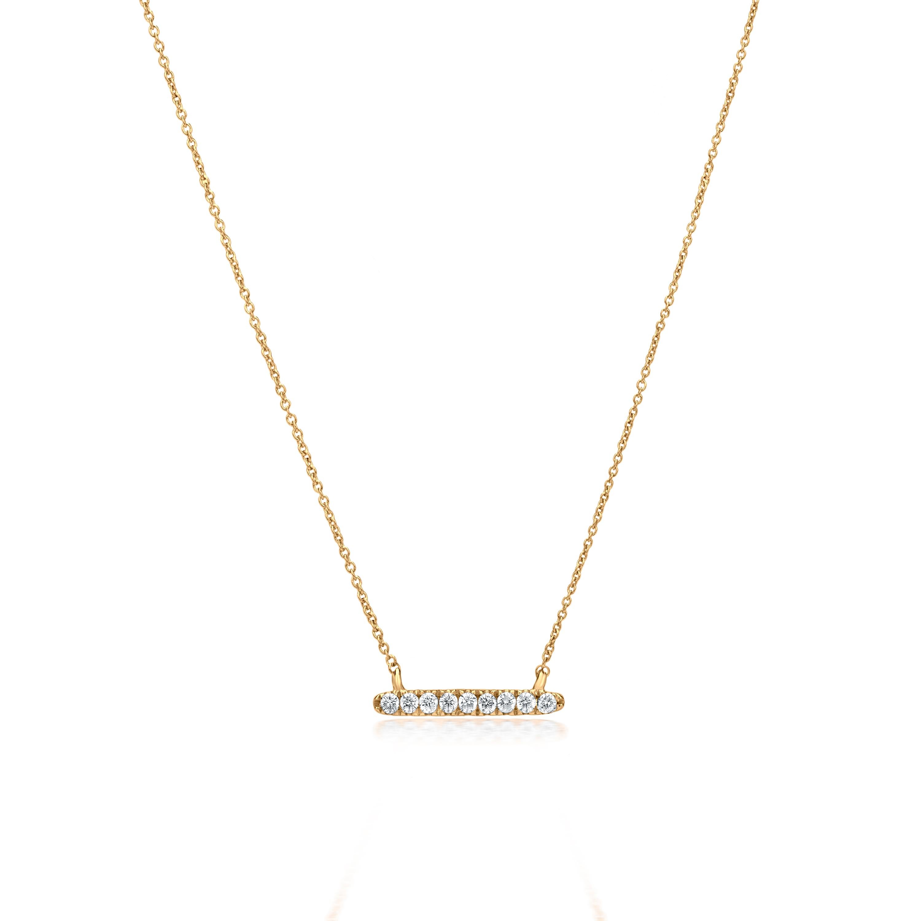 Subtle yet pretty this Luxle bar pendant necklace is the new fashion statement. It is featured with 9 round cut diamonds, totaling 0.11Cts adorned in an adorable motif of a bar. The pendant is stationed across an elegant cable chain with a hanging
