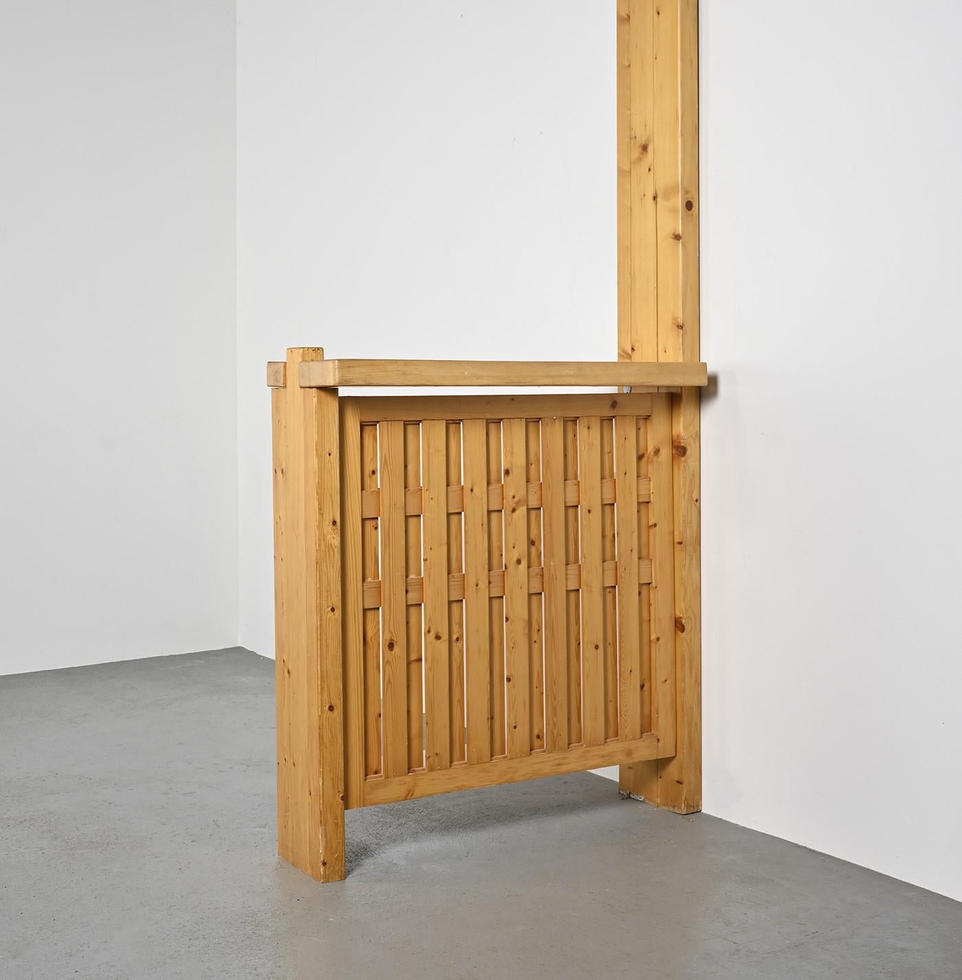 
Bar designed by Charlotte Perriand for the Nova residence, built and furnished at Les Arcs 2000 in the French Alps in 1979.

Made of solid pine, it was placed in front of the kitchen and consists of 3 shelves at the back, a thick profiled