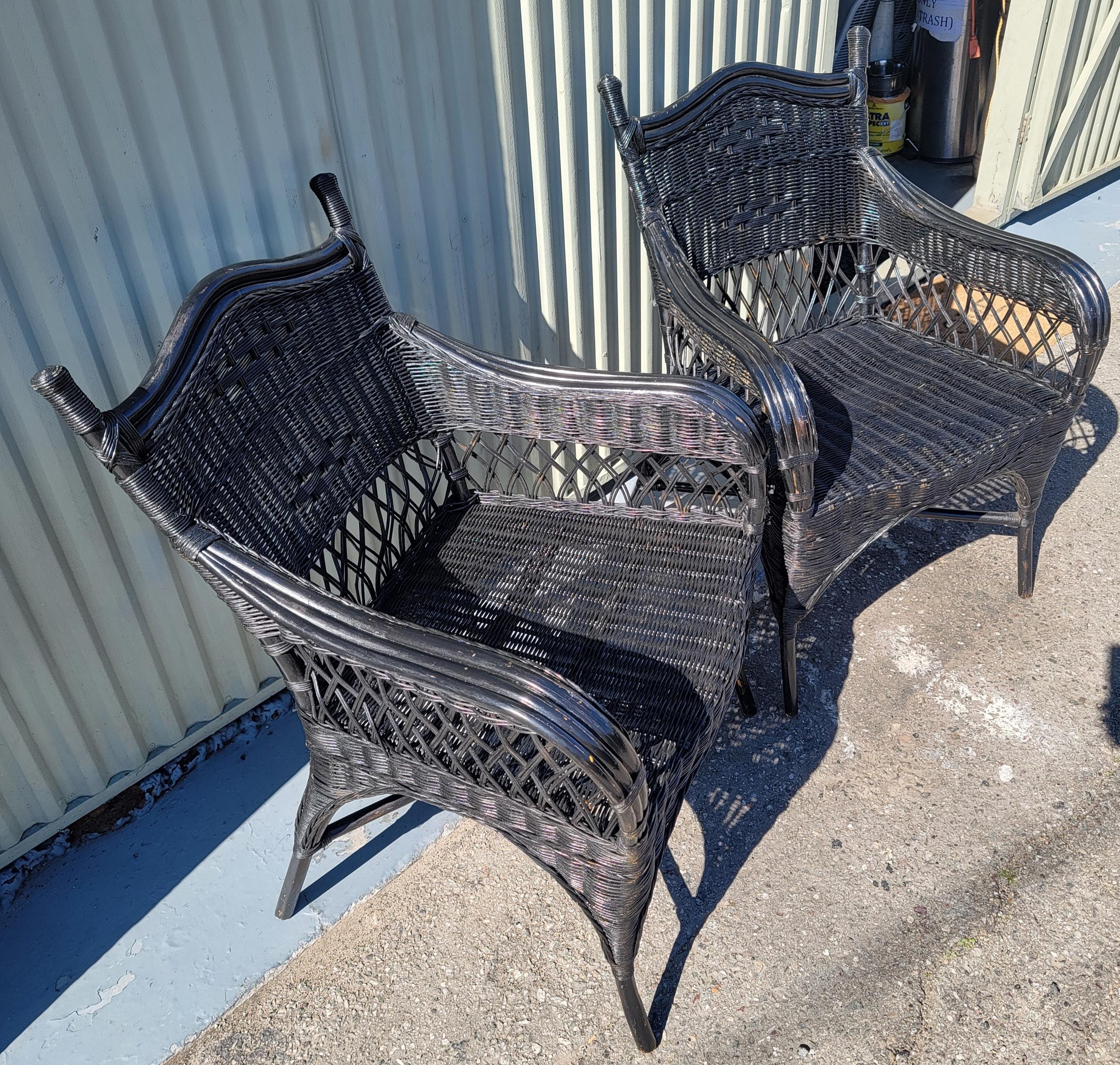 These amazing black painted wicker chairs are in a Bar Harbor style and have been sprayed with a all weather protector spray.