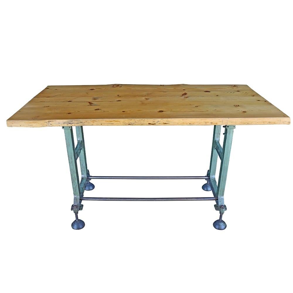 This beauty of an industrial table has an assortment of fun design features. The antique aqua blue industrial legs are fitted with adjustable cup feet allowing you to level the table on an uneven surface, a cool throwback to their original machinist