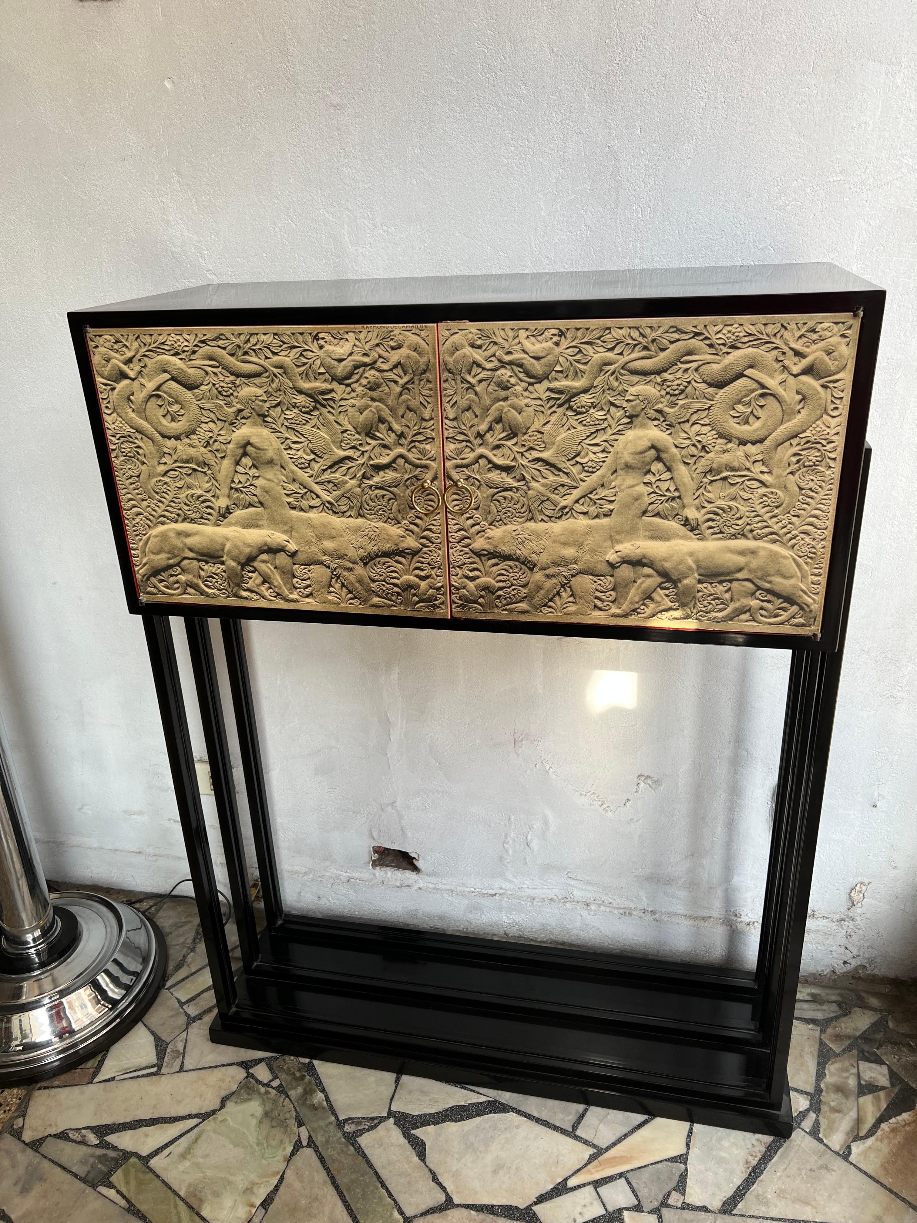 Amaizing Bar 

Materials: wood 
Style: Art Deco Intervened by the artist Marcelo Peña year:2021
If you want to live in the golden years, this is the bar that your project needs.
We have specialized in the sale of Art Deco and Art Nouveau and Vintage