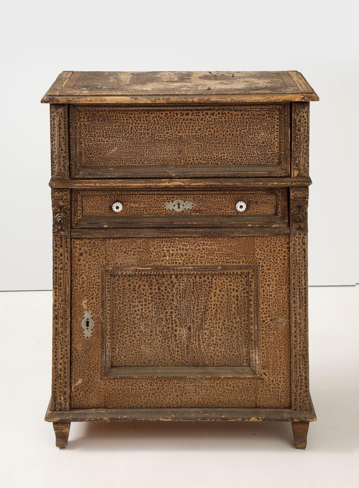 This unique flip-top French 19th C. bar server cabinet is a true statement piece, featuring a light green painted interior revealed when the top flips open and is held in place by sturdy hinges. A single drawer, adorned with two porcelain knobs and