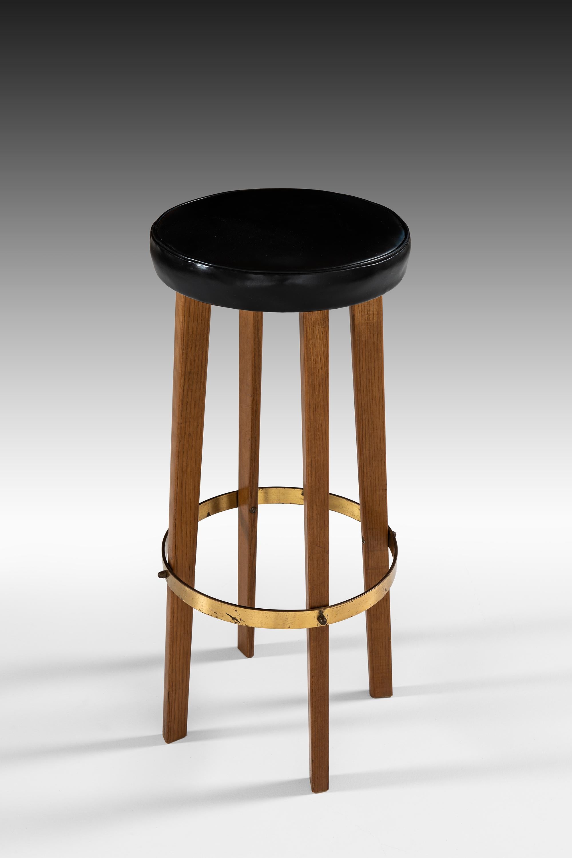 Swedish Bar Stools in Teak, Brass and Leather Produced in Sweden