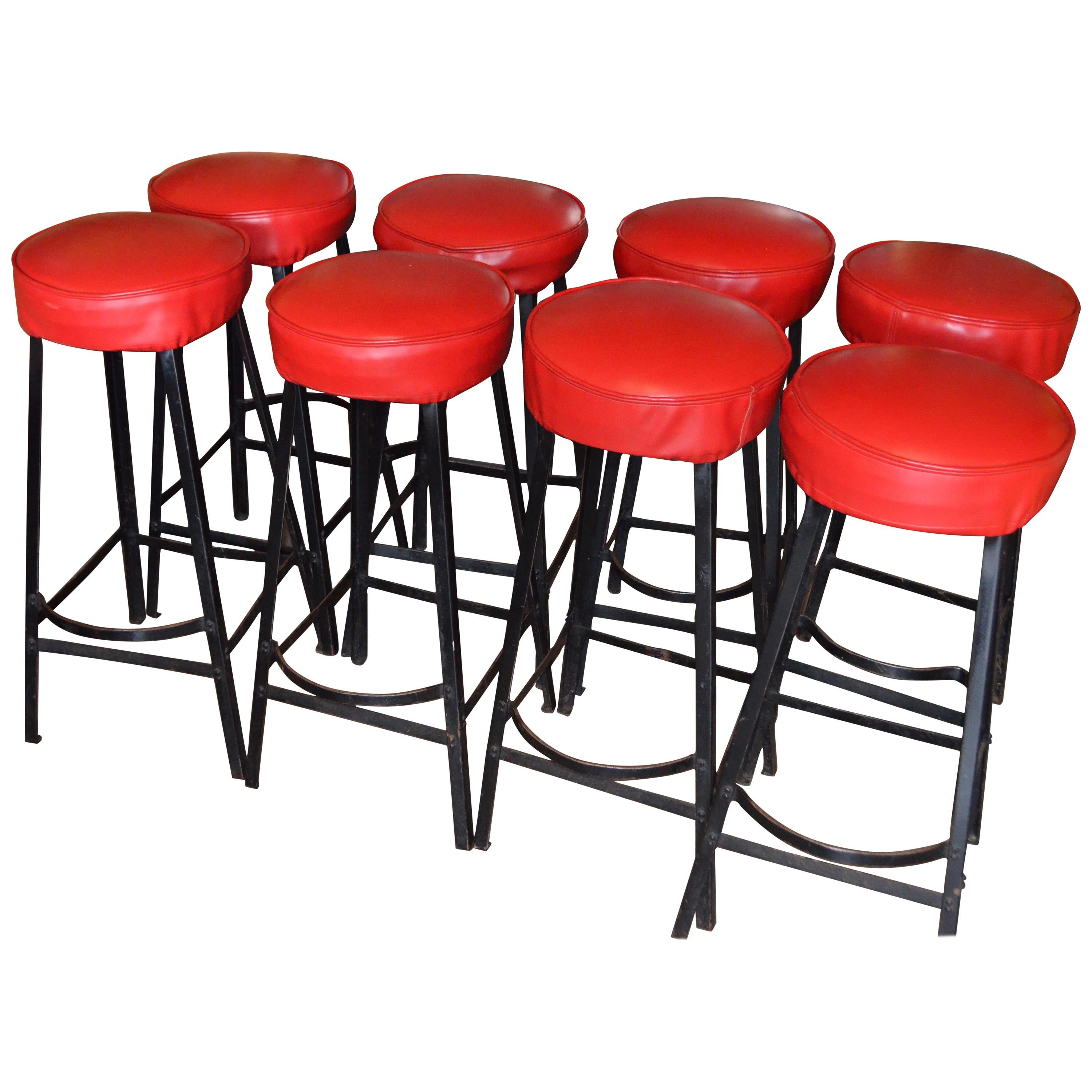 Bar Stools with Black Steel Frames and Startlingly Red Vinyl Seats. Set of 8