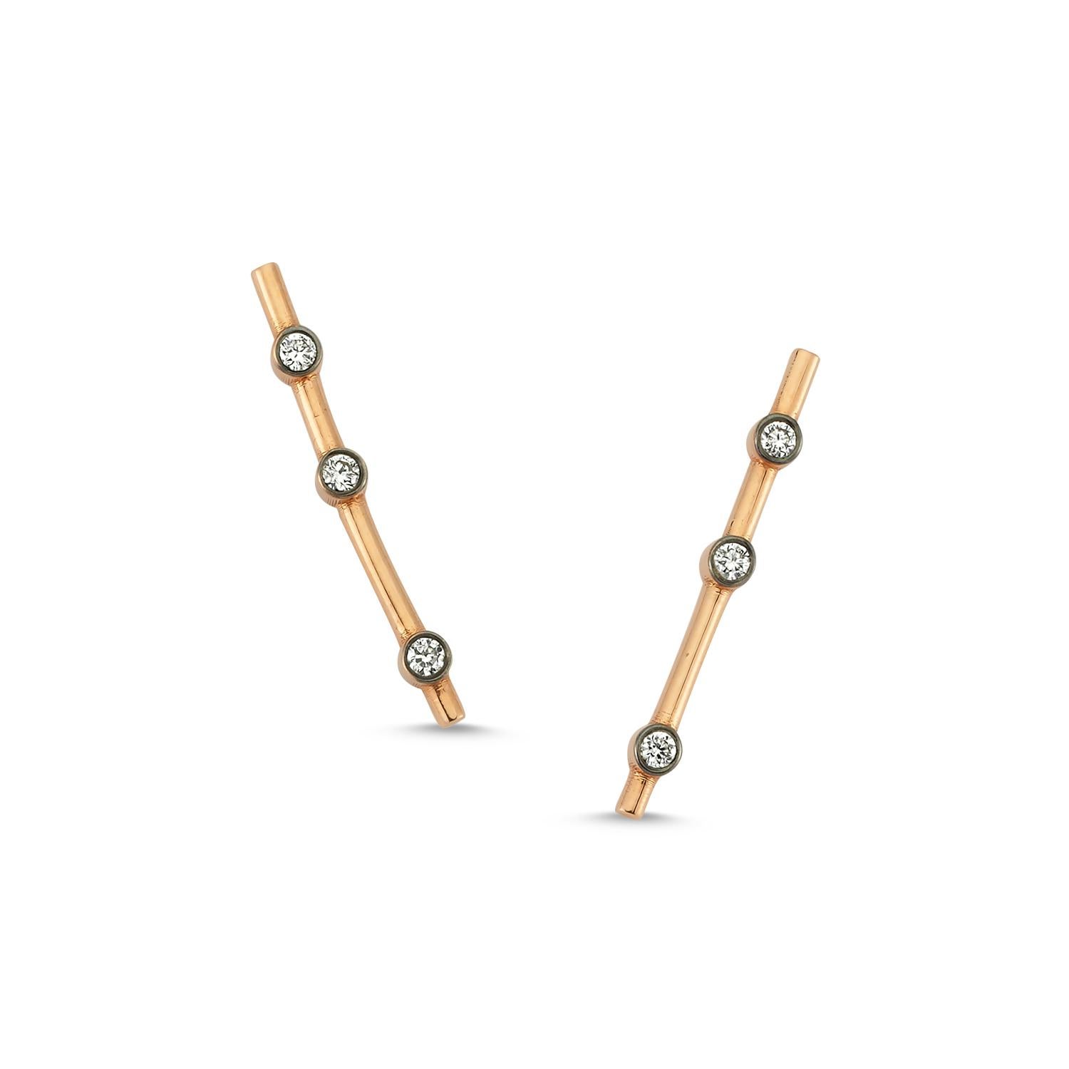 Bar stud earring with 3 single stone white diamond (single) by selda jewellery

Additional Information:-
Collection: Thunder collection
14K Rose gold
0.06 ct White diamond
Length 2cm