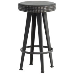 Sgabello basso "Bar Stud" con borchie in pelle nera e base in acciaio di Moroso per Diesel