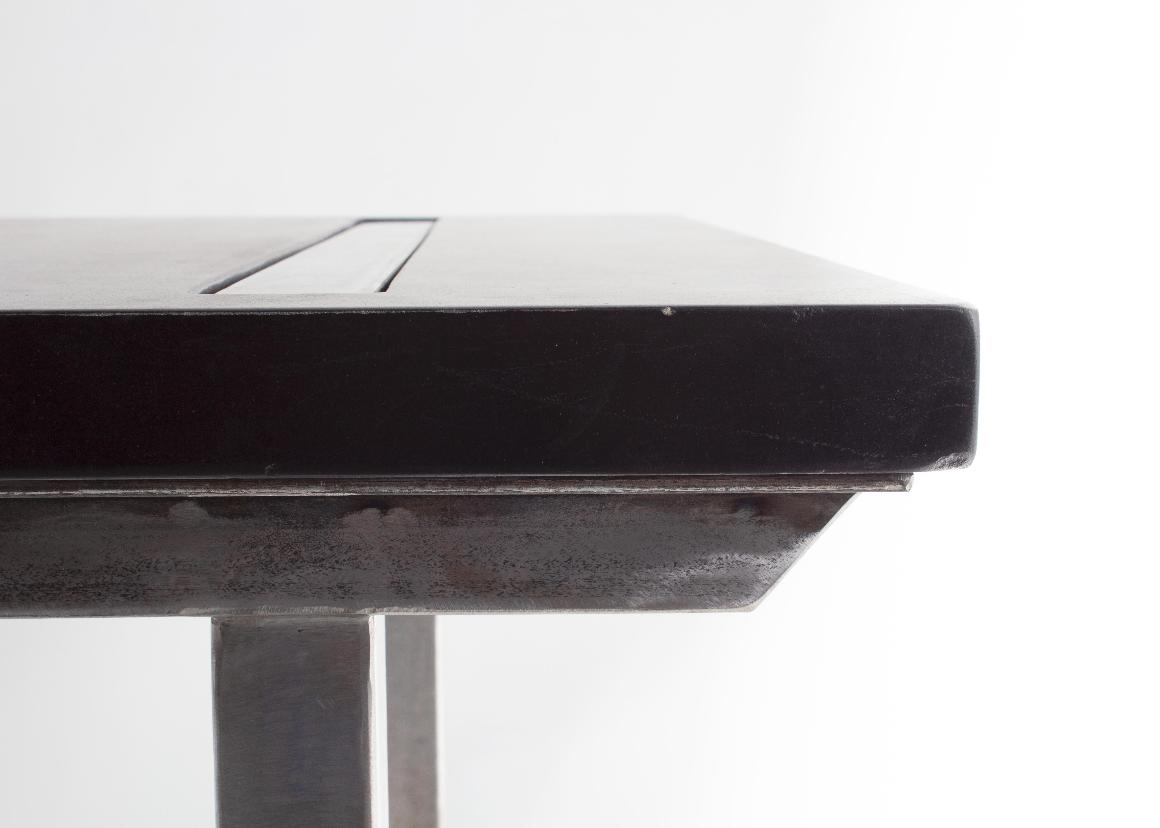 Organic Modern Bar Table with a Polished Steel Base and Ebonized Limestone Top For Sale
