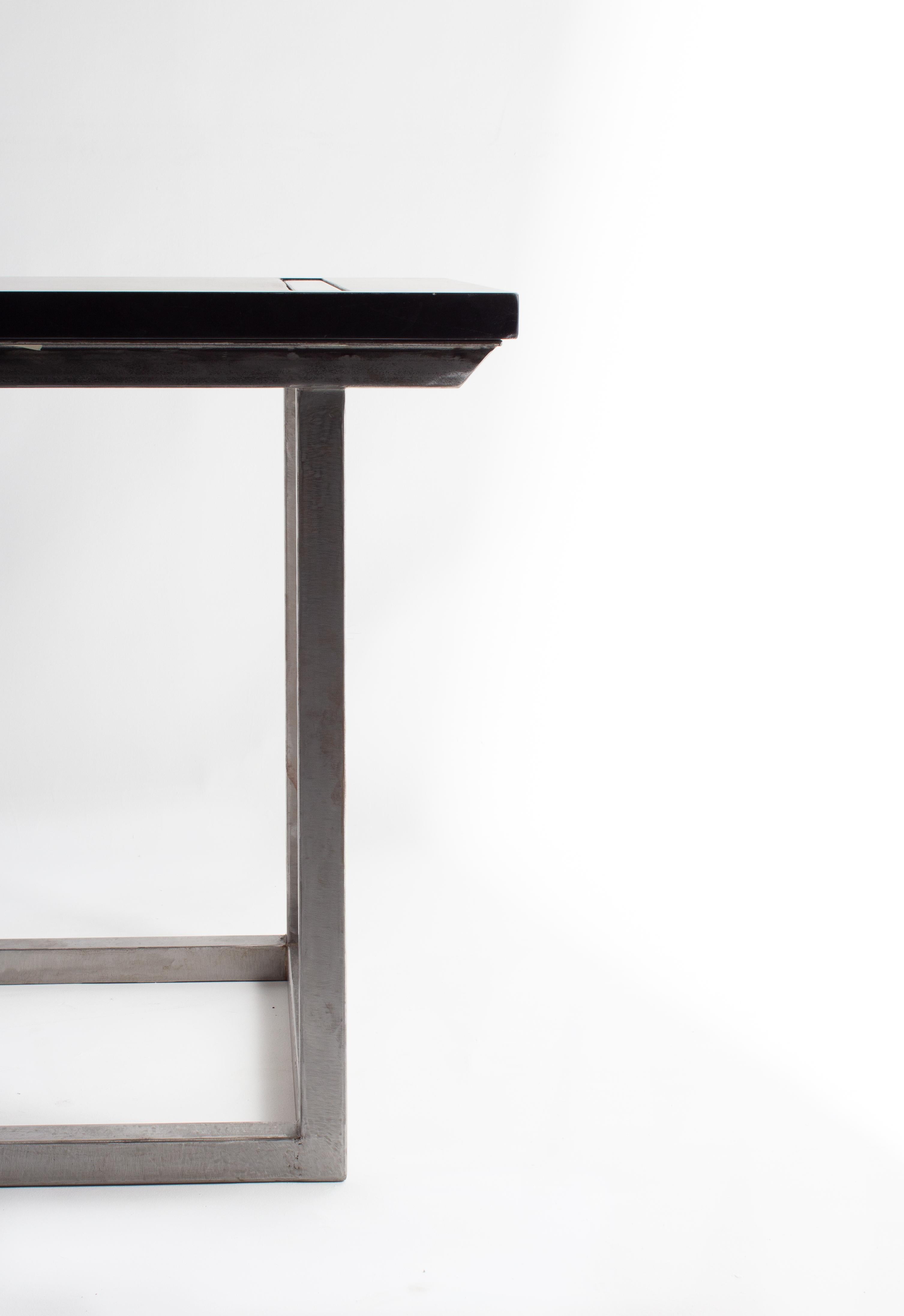 American Bar Table with a Polished Steel Base and Ebonized Limestone Top For Sale
