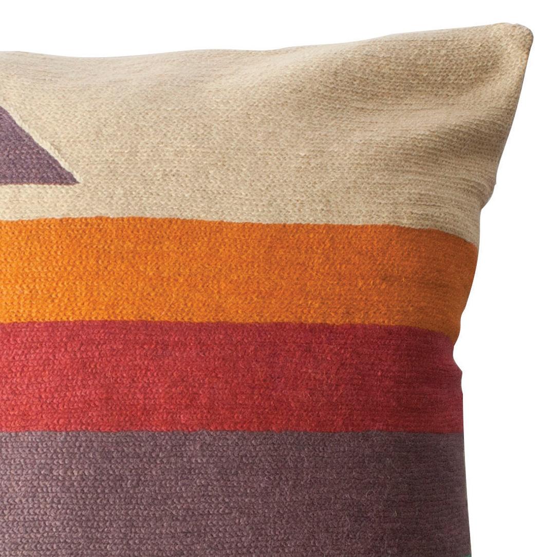 This pillow has been hand embroidered by artisans in Kashmir, India, using a traditional embroidery technique which is native to this region.

The purchase of this handcrafted pillow helps to support the artisans and preserve their craft.

We