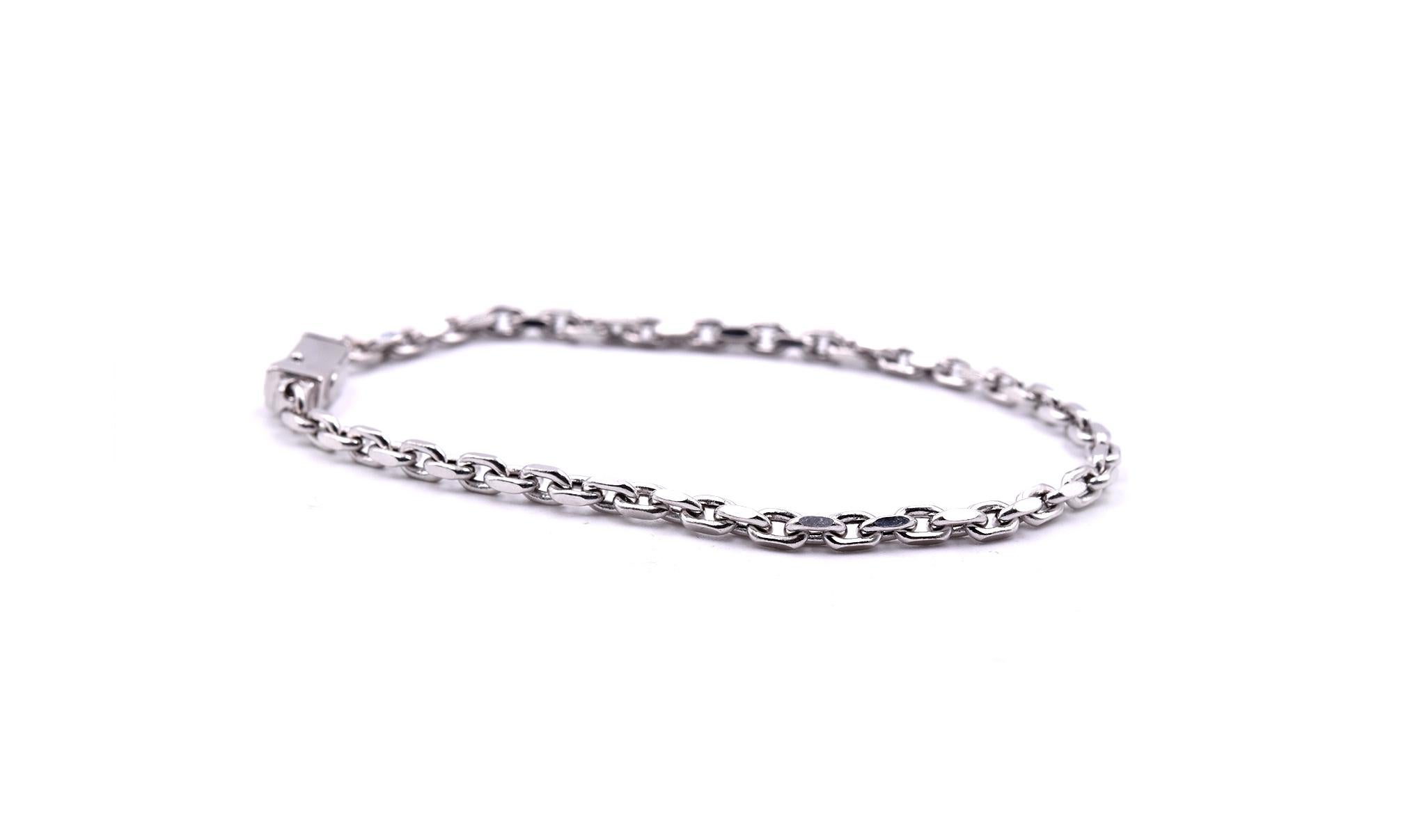 Designer: Baraka Brev
Material: 18k white gold
Dimensions: bracelet will fit 7 ¼ -inch wrist and it is 2.97mm wide
Weight: 5.90 grams
