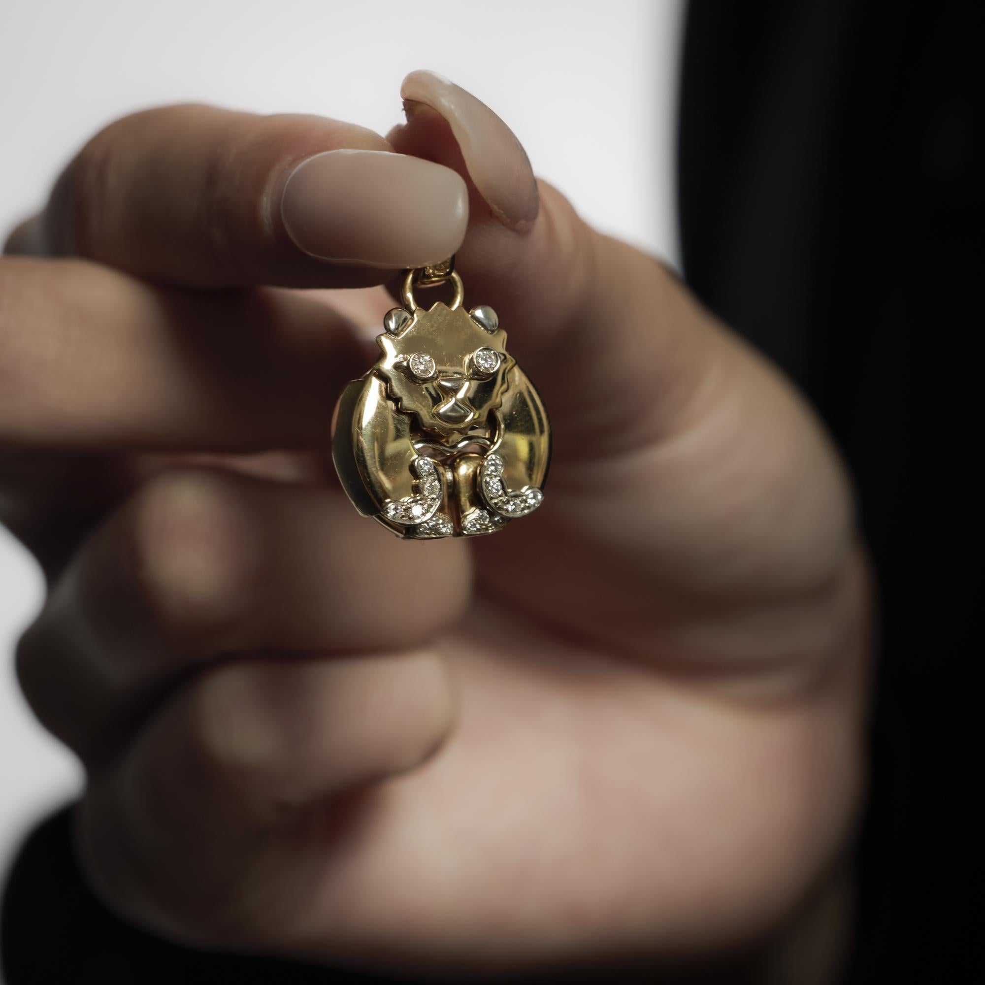 This contemporary Baraka pendant from the 2010’s is crafted in rich 18k yellow gold and set with sixteen round brilliant cut diamonds totaling approximately .20 carats in G color and VS clarity. Signed, numbered, and fully hallmarked, it reflects