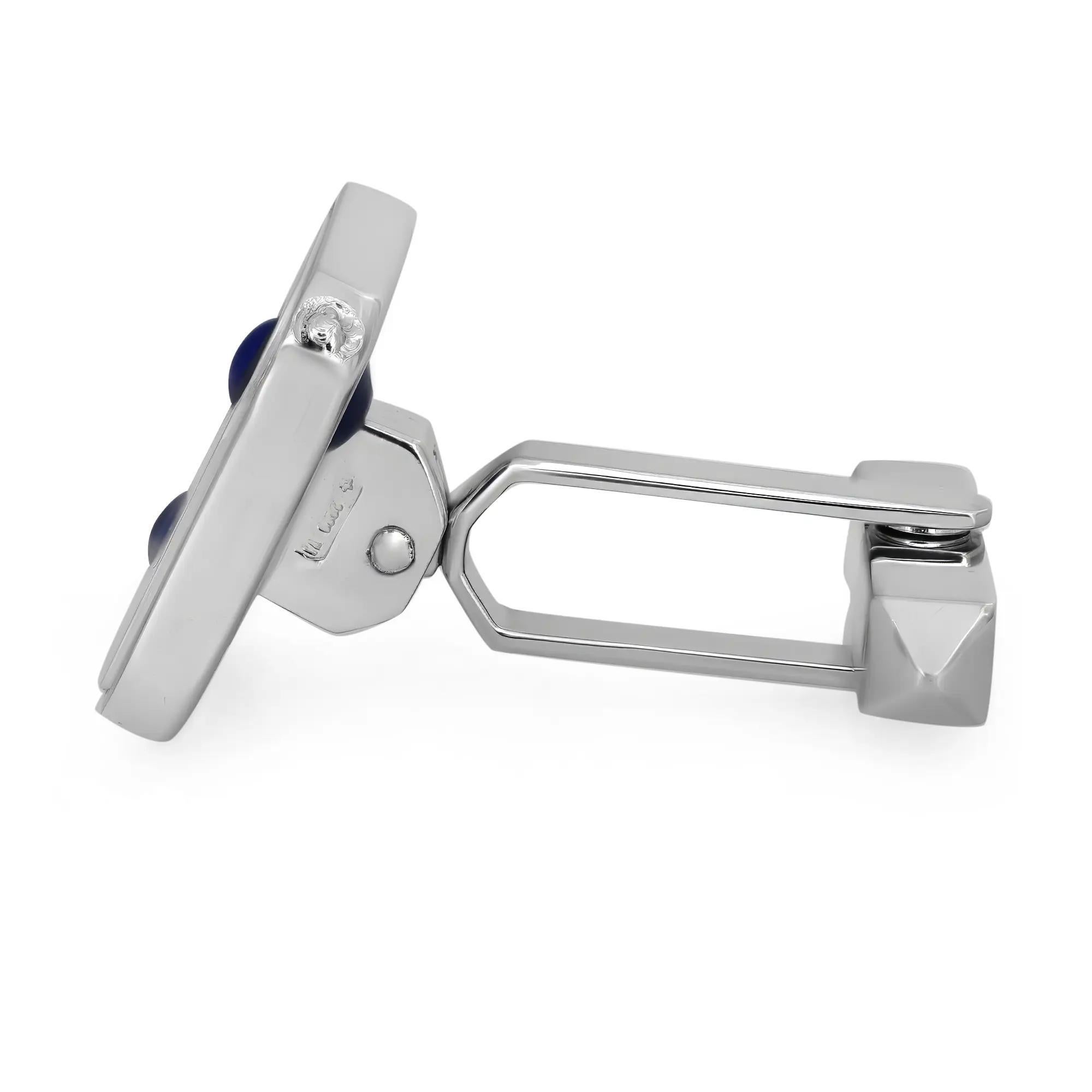 These stunning Baraka cufflinks feature a square shape with two ball-shaped Lapis Lazuli stones, studded in each cufflink, crafted in 18K white gold. Size: 15mm. Total weight: 15.89 grams. Condition: Display model. Made in Italy. Comes with a Baraka